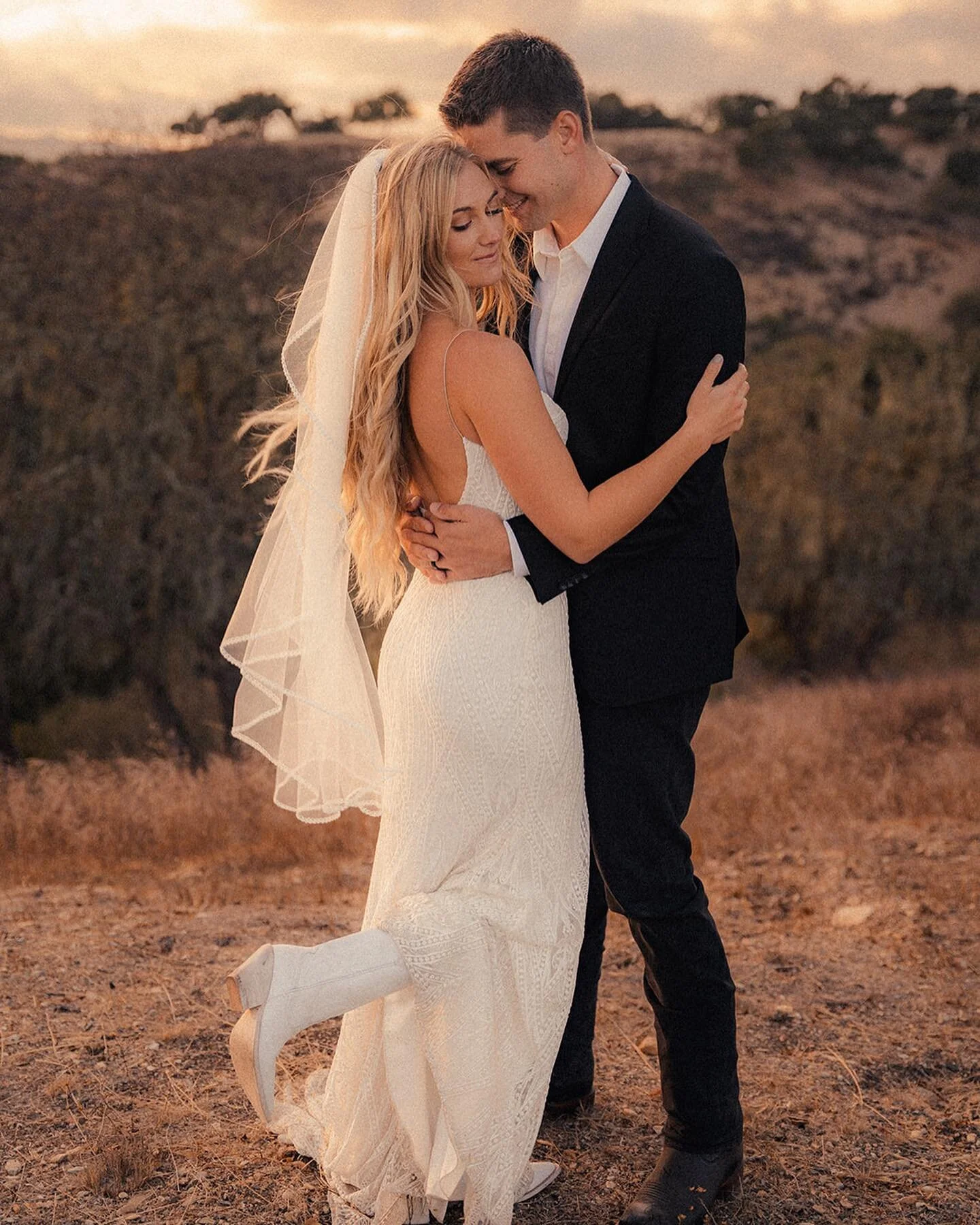 Golden hour moments with Moondance babe Carli in Jade by @ruedeseinebridal ✨🤍 🌾 

Captured by: @maryvincentiphoto 

real bride, wedding dress inspo, bridal inspo, bridal shop, wedding dress shopping, boho bride