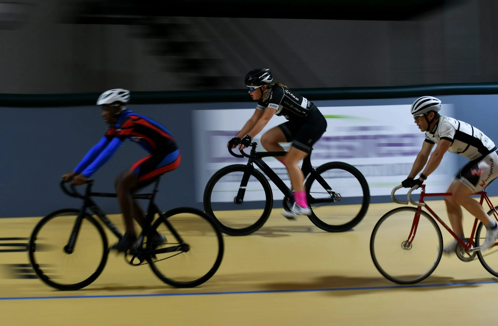 Donell Anderson, left, 12, of Detroit, Autumn Caya, 15, of Shelby Township and Charles Moore, 45, of Plymouth ride warm up laps. Robin Buckson, The Detroit News