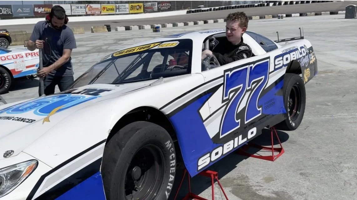 New Baltimore teen creating a buzz in the car racing world, bringing smiles to pediatric cancer patients