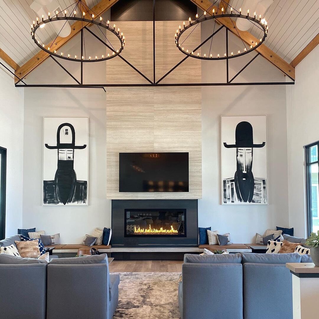 Well this came together well. We had the pleasure of creating this steel surround fireplace with a towering 22 foot of Spanish quartz flanked by 21 feet of GFRC concrete bench from wall to wall capped off with comfy leather cushions. This space is ab