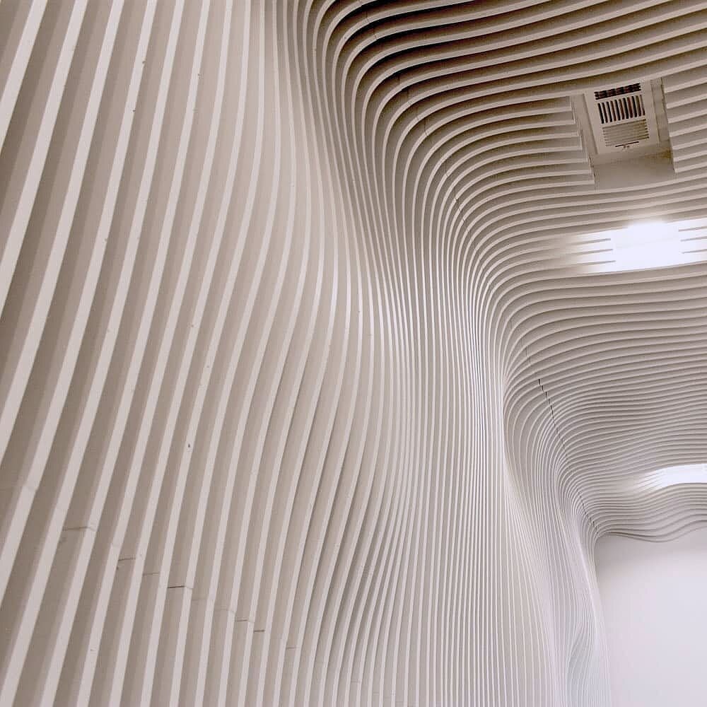 Conceptualized by @designbytrio

Designed and fabricated by yours truly

Such an epic experience watching this topographical slatted wall detail come to life in the new lobby of @park40apartments.

We thought we'd give you a behind the curtain view o