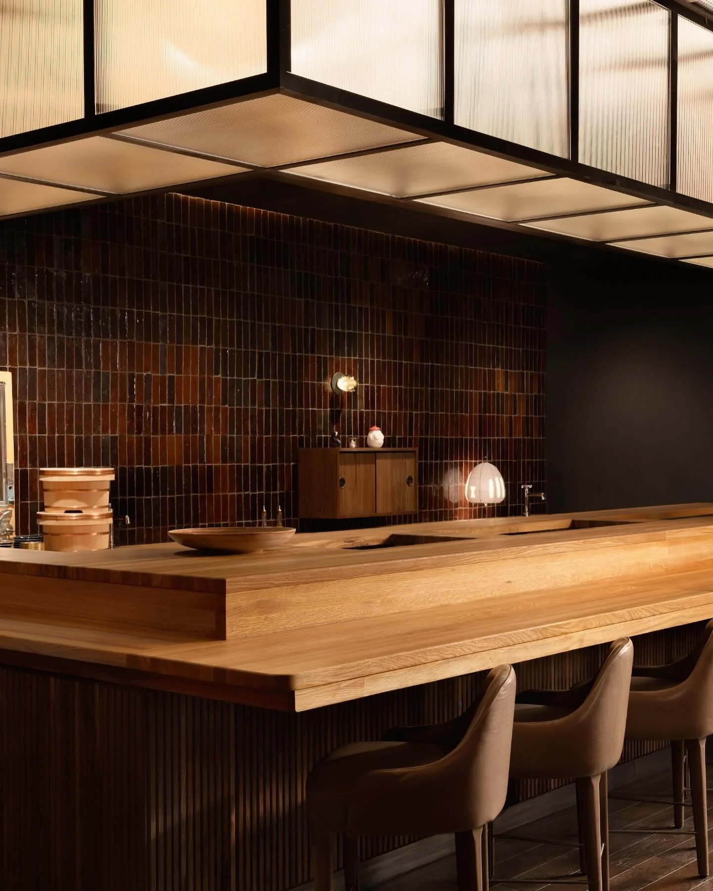 📍Hai Si; Aspen, CO

The bar at Hai Si anchors the space through material and restraint.

Solid wood surfaces, clean horizontal lines, and subtle illumination work together to create a quiet focal point &mdash; one that balances warmth with precision