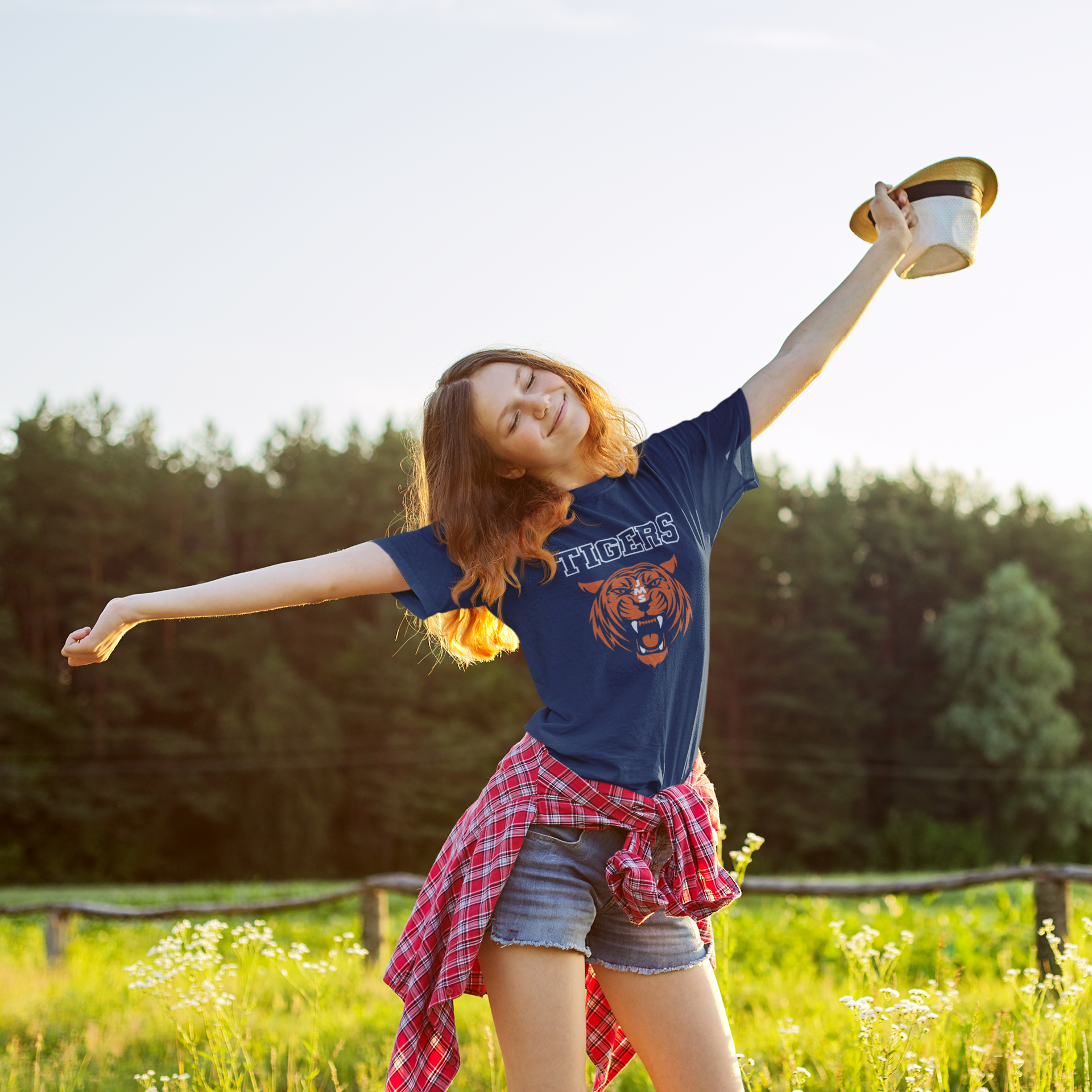 t-shirt-mockup-featuring-a-teenager-smiling-at-an-outdoor-place-m21763-r-el2.png