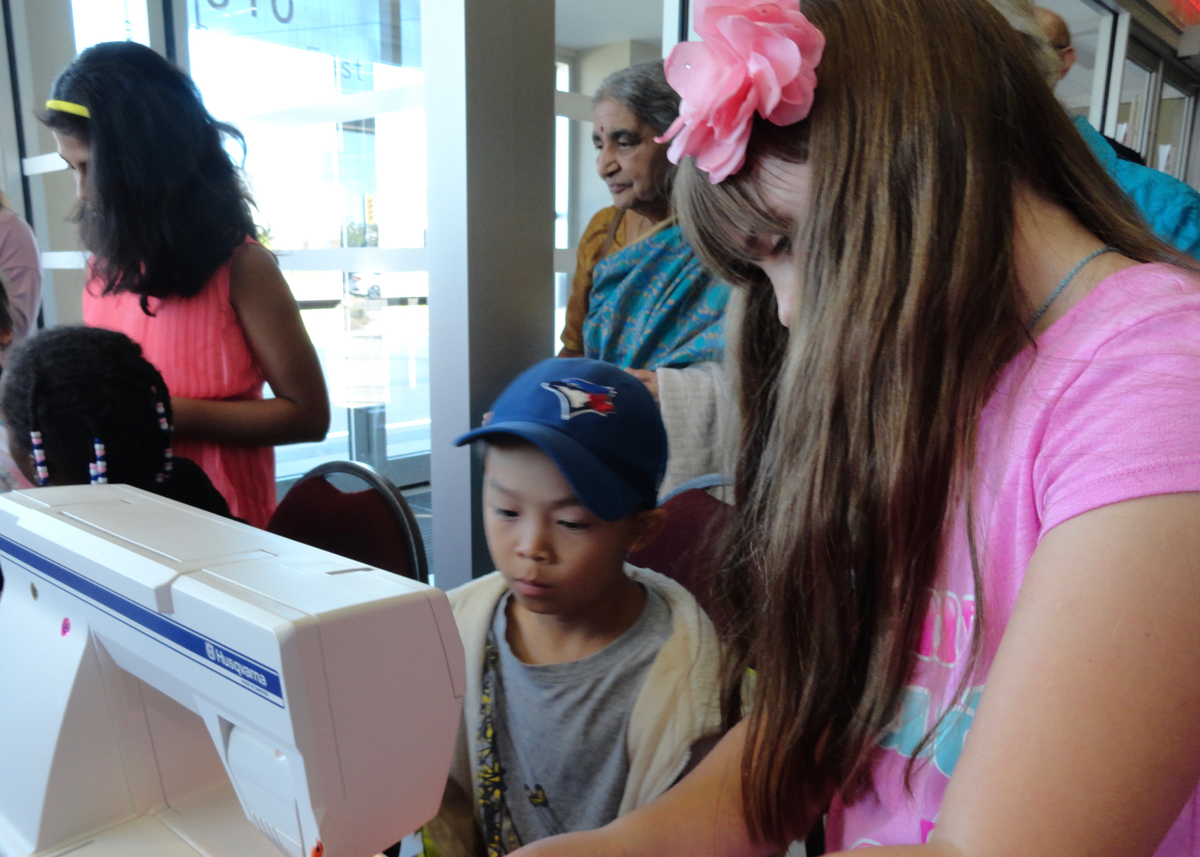 Kids learn to sew at Althea's