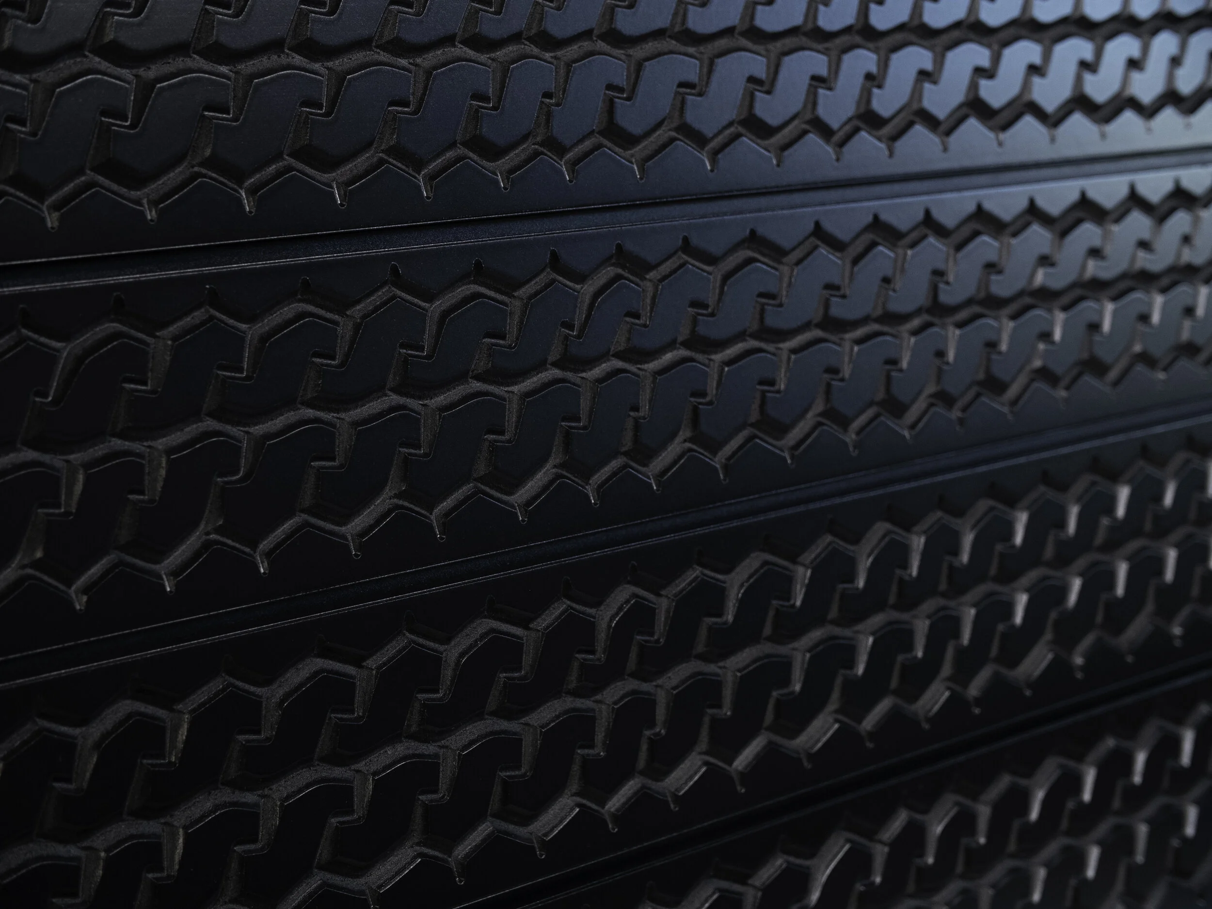 STX tire tread black angle shot.jpg