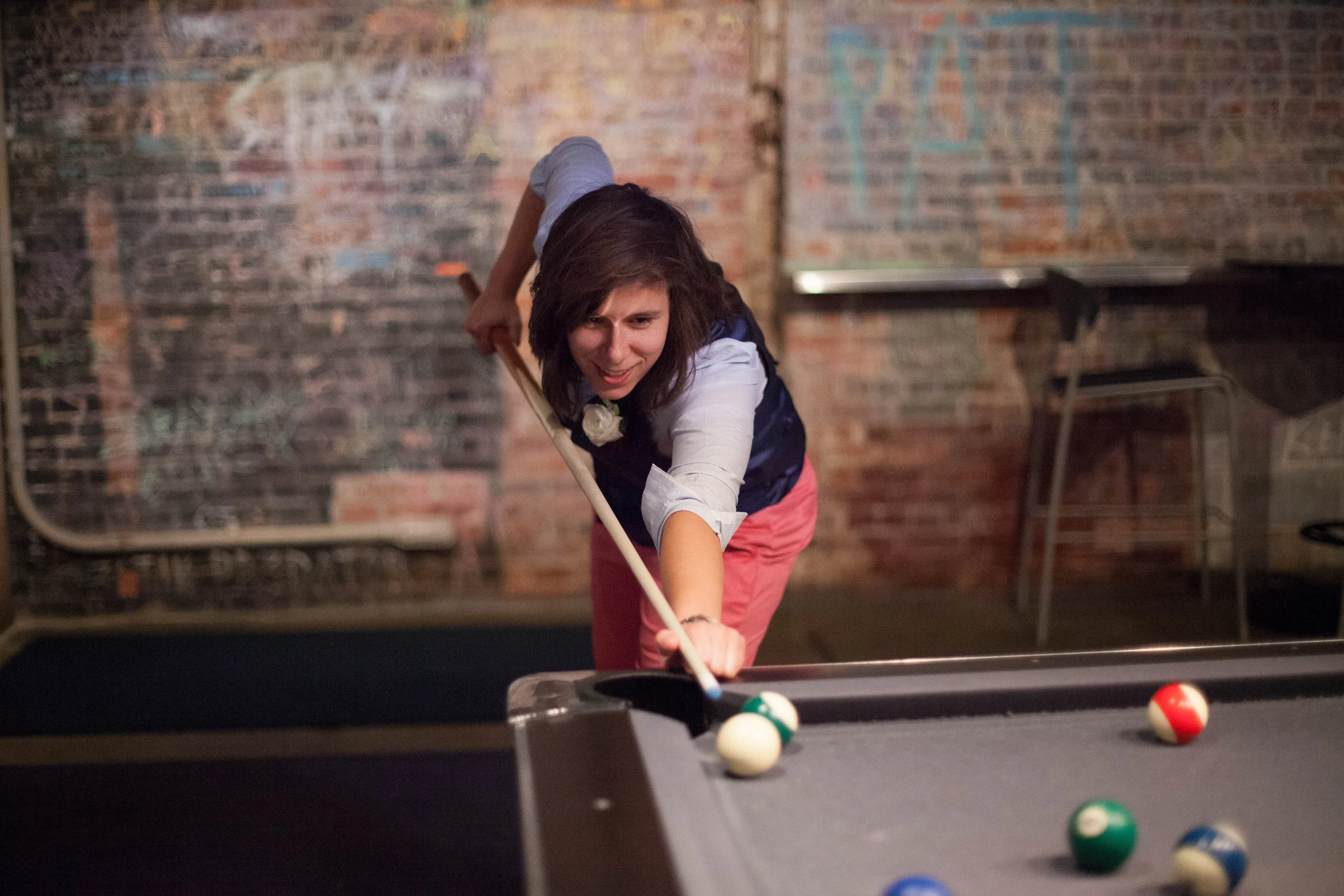Great-Room_bride-playing-pool.jpg