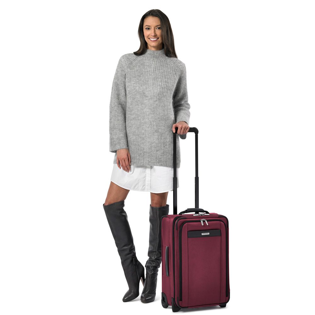 Female Model With Transcend Tall Carry-On Expandable Upright Two Wheel Merlot Red