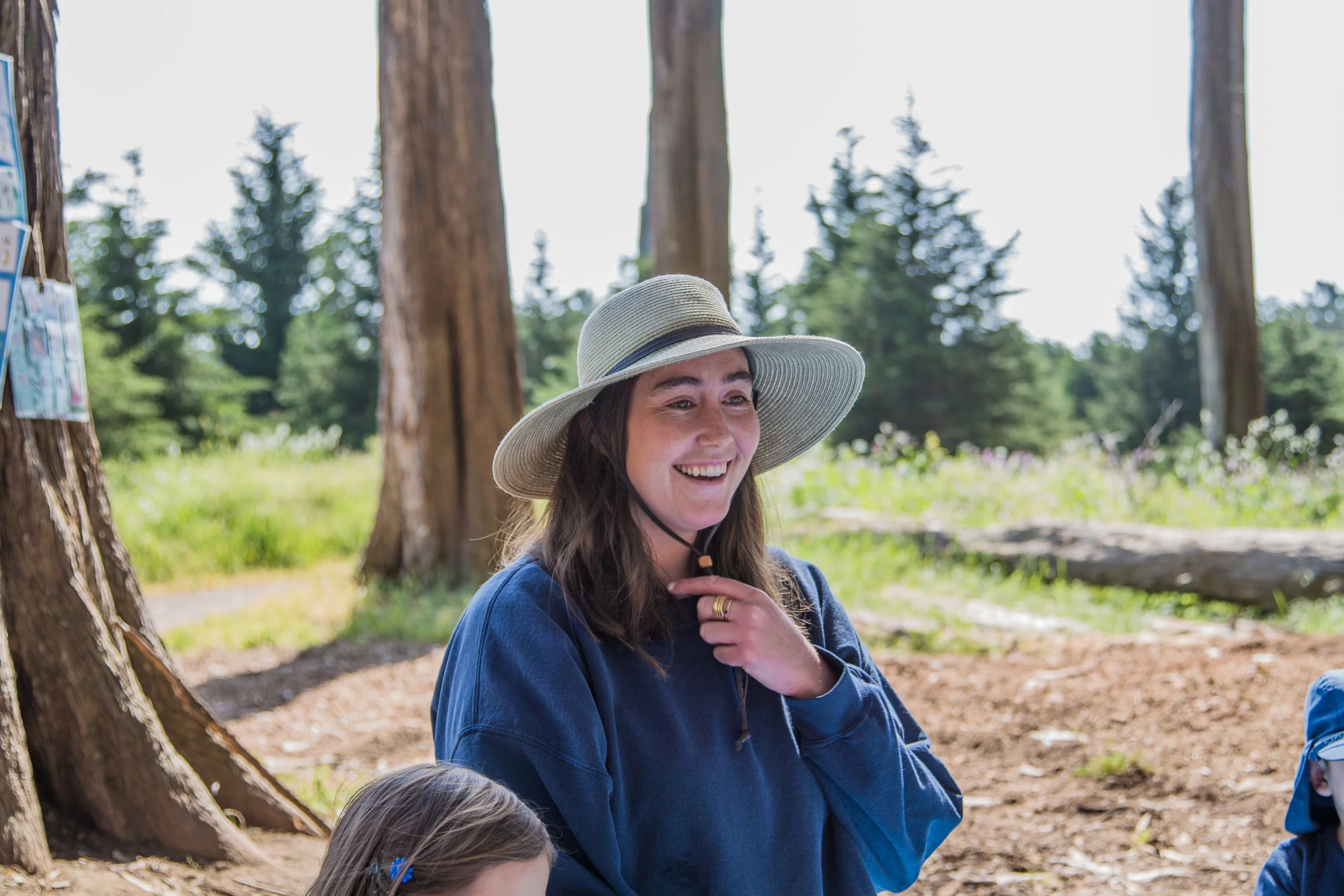 Kelly outside working at the forest school.