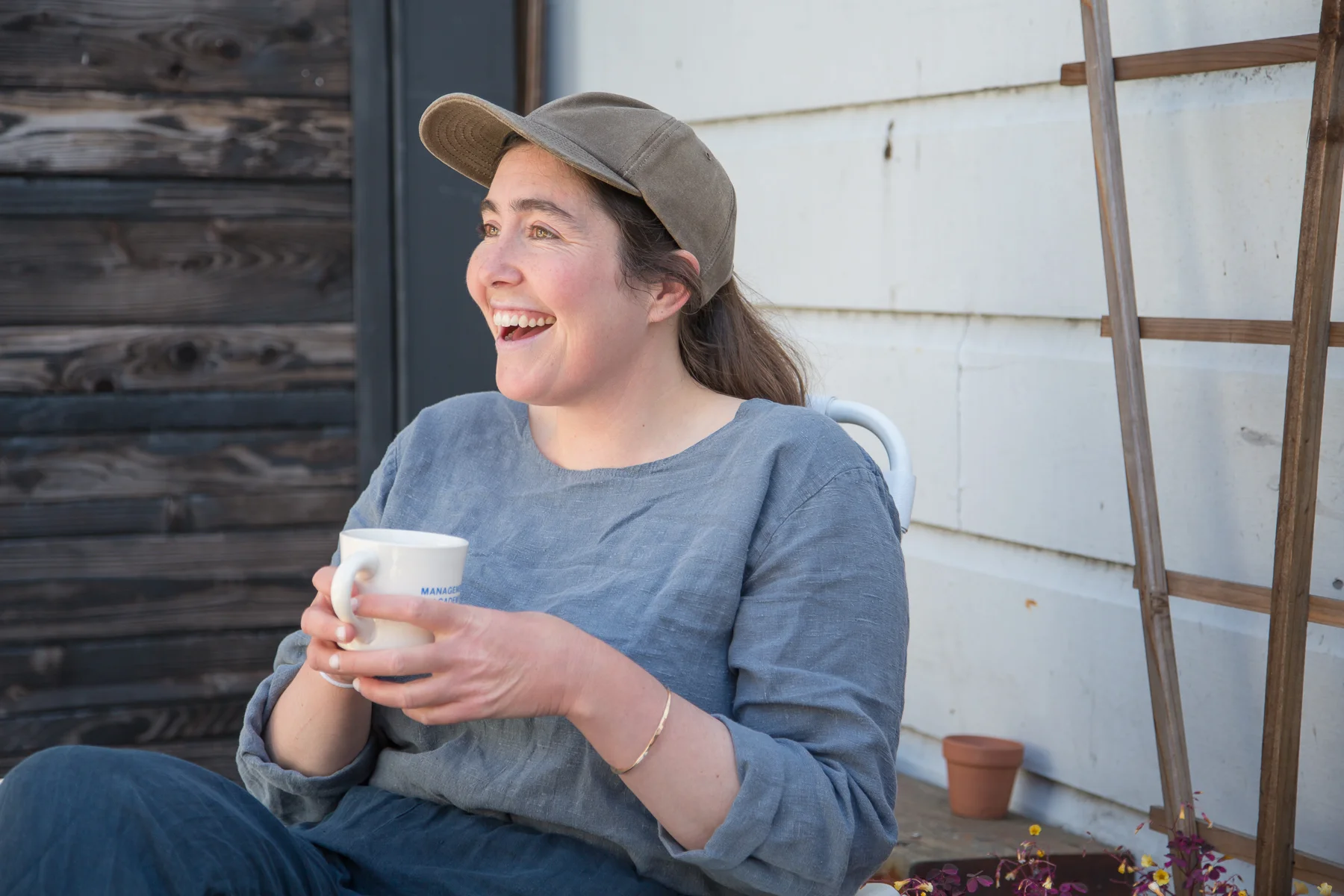 Conversing with Kelly at home in her front patio.
