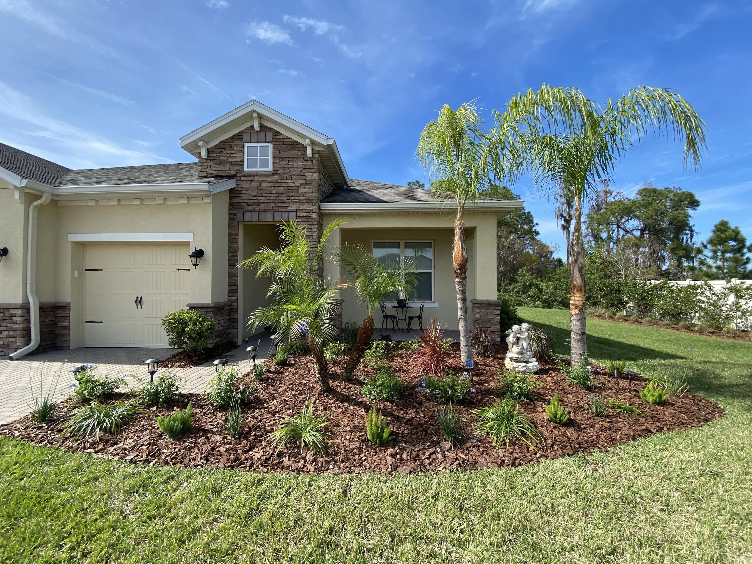 rlc-finished-front-yard-palm-landscape-tampa.jpg