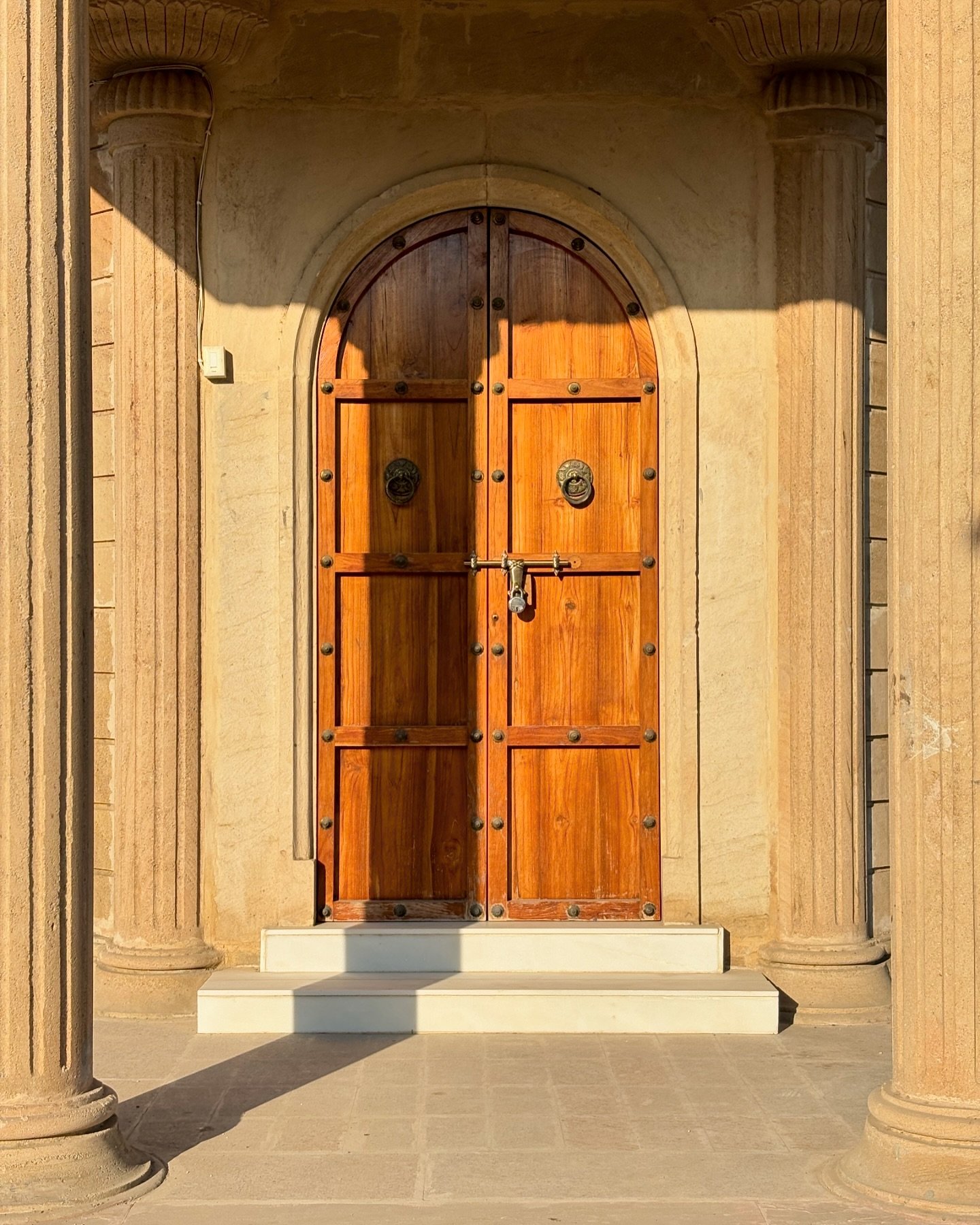 These handcrafted solid wood doors, designed 4 years ago are weathering beautifully. ✨
Recreated an antique door design to fit the location and surrounding spaces. 
They include a set of concealed windows within the framework, for creating access for