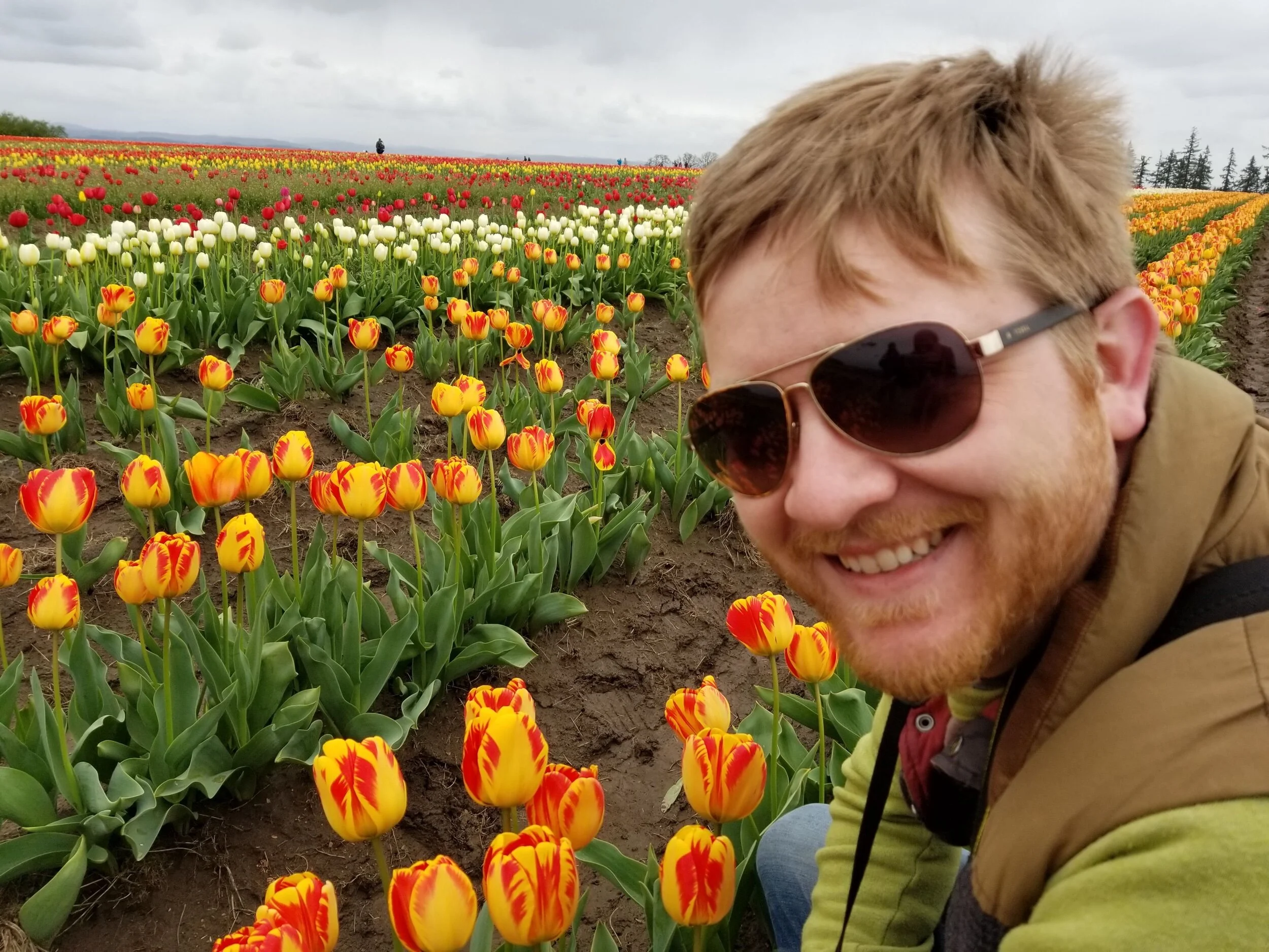 So lucky to have a hubby that humors me and gets his picture taken with the flowers.