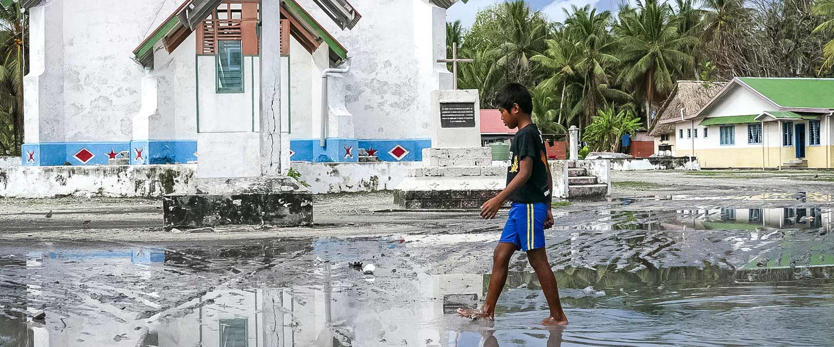 Main square of Nui Island under water. Tropical Cyclone Pam caused widespread damage and marine flooding. Photo: Silke von Brockhausen/UNDP