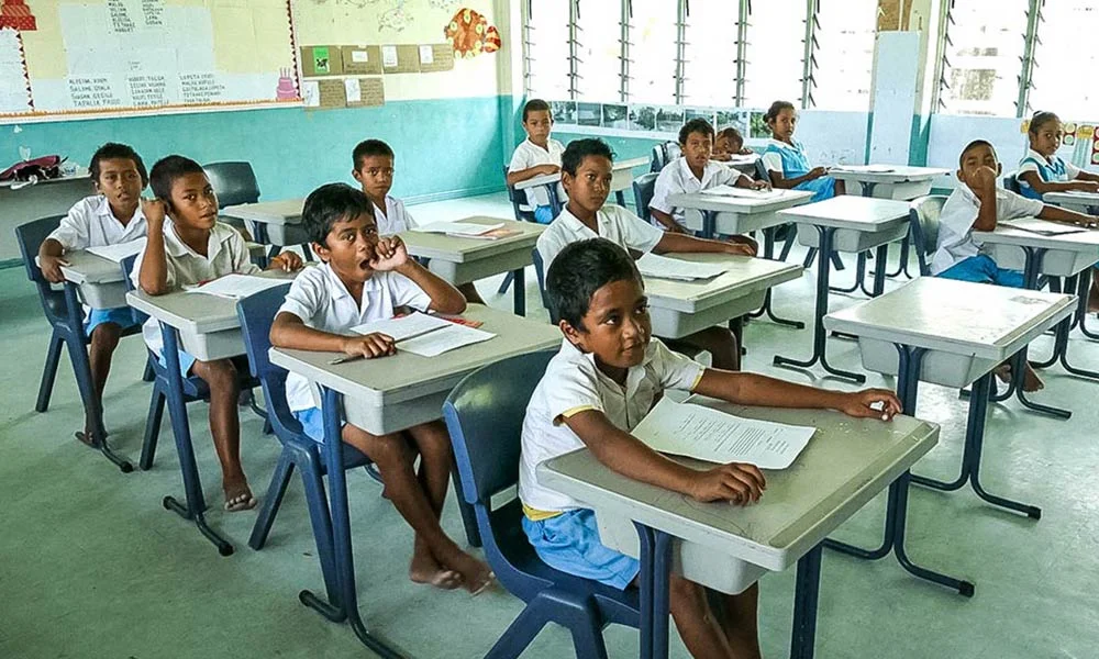 School children, Nui island. A wave surge during Cyclone Pam left the building flooded. Photo: Silke von Brockhausen/UNDP