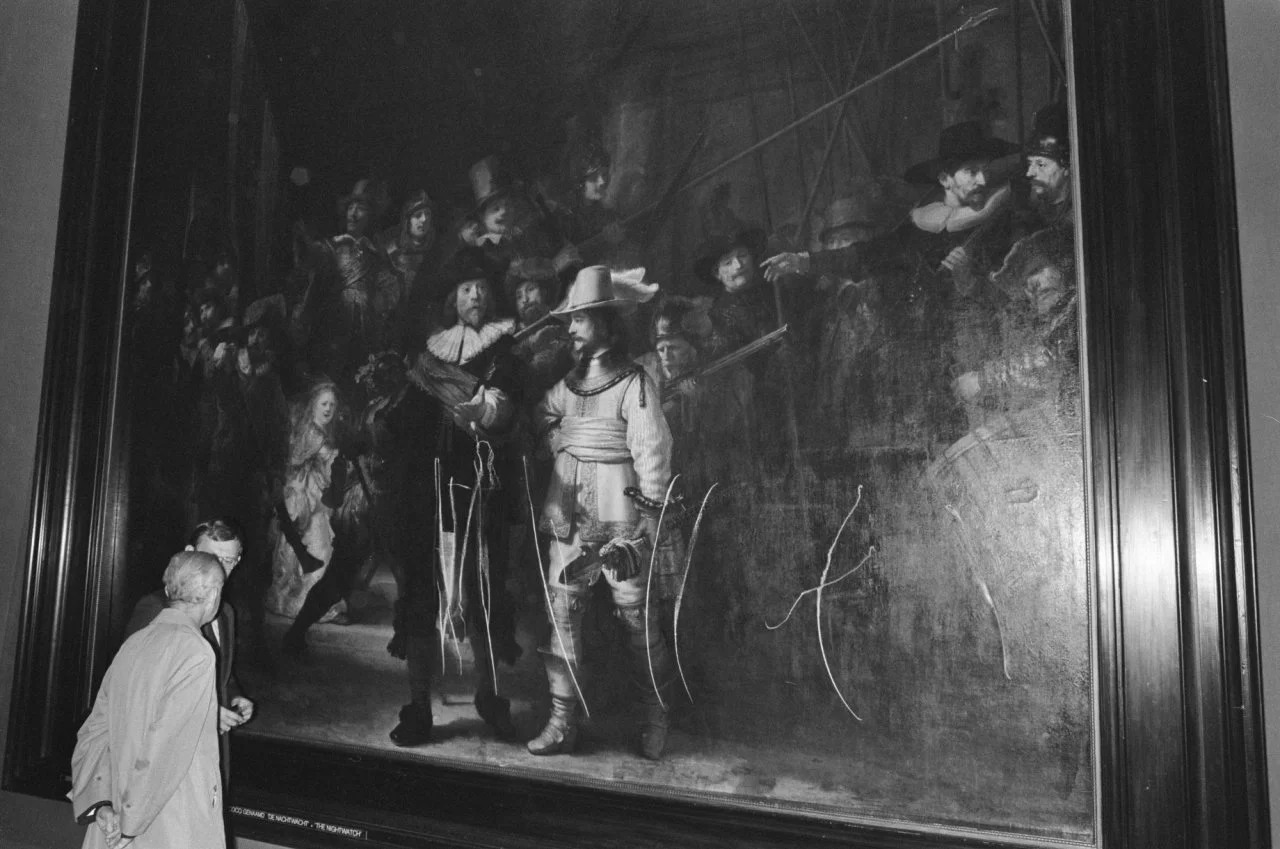 Rembrandt, “The Night Watch” 1642 / bread knife In September 1975, this painting was damaged while on view at Amsterdam’s Rijksmuseum. Wilhelmus de Rijk, a 38-year-old former teacher from the village of Bloemendaal, used a bread knife to carve a series of jagged cuts into the canvas. Even after a guard grabbed his arm, de Rijk continued moving across the painting, slashing with the knife and tearing away a portion of canvas. Rijk, who had obtained the knife from at a downtown restaurant where he’d eaten lunch before going to the museum, told police he’d been “sent by the Lord.”“I was ordered to do it,” he said. “I had to do it.” Authorities said he had a history of mental illness and was initially held on a charge of willful destruction. In the end, he was not taken to trial, but instead sent to an asylum, where he eventually committed suicide. This wasn’t the first or last time the painting was attacked: in separate incidents, it was sprayed with acid, slashed by knife, and had portions deliberately removed by Amsterdam officials. Learn more: http://art-damaged.tumblr.com/post/21583538174/rembrandt-the-night-watch-butter-knife-acid