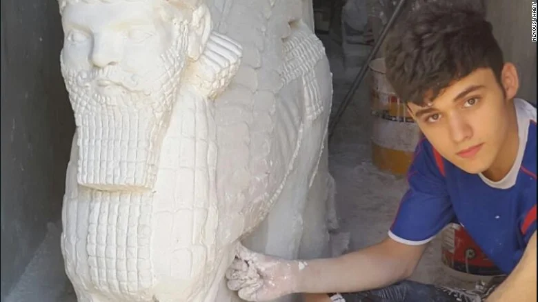 “When footage emerged of ISIS destroying the ancient city of Nimrud outside Mosul, the world stood powerless in the face of a group of militants using sledgehammers and electric drills to obliterate centuries-old archaeological gems. But 17-year-old Nenous Thabit rolled up his sleeves and began work on replicating the sculptures. "They waged a war on art and culture, so I decided to fight them with art,“ he says. He did so by sculpting immaculate statues that resembled some of the most precious Assyrian artifacts lost in Nimrud and other ancient areas in and around Mosul. In a modest apartment in the Kurdish city of Irbil, where Thabit and his family took refuge after fleeing Mosul, the young artist has meticulously carved 18 Assyrian statues and one mural over the past year.”
