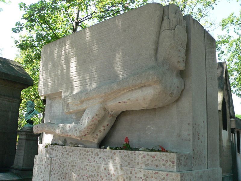 Jacob Epstein “Oscar Wilde’s tomb” / hammer & chisel, kisses
(In 1961, the sculpted angel that kneels atop Oscar Wilde’s tomb in Paris’ Pere Lachaise Cemetery was vandalized by two English women. The angel, done by sculptor Jacob Epstein, was originally endowed with over-sized testicles, which the two women found distasteful. The detached testicles were recovered soon after by the cemetery keeper, who ended up using them as paper weights. They were not reattached to Epstein’s piece.
The tomb was also famous for bearing lipstick traces of kisses left by hundreds of admirers. Over time, the grease from the kisses began to cause significant damage to the limestone. As a result, a glass barrier was installed to shield the monument in 2011.)