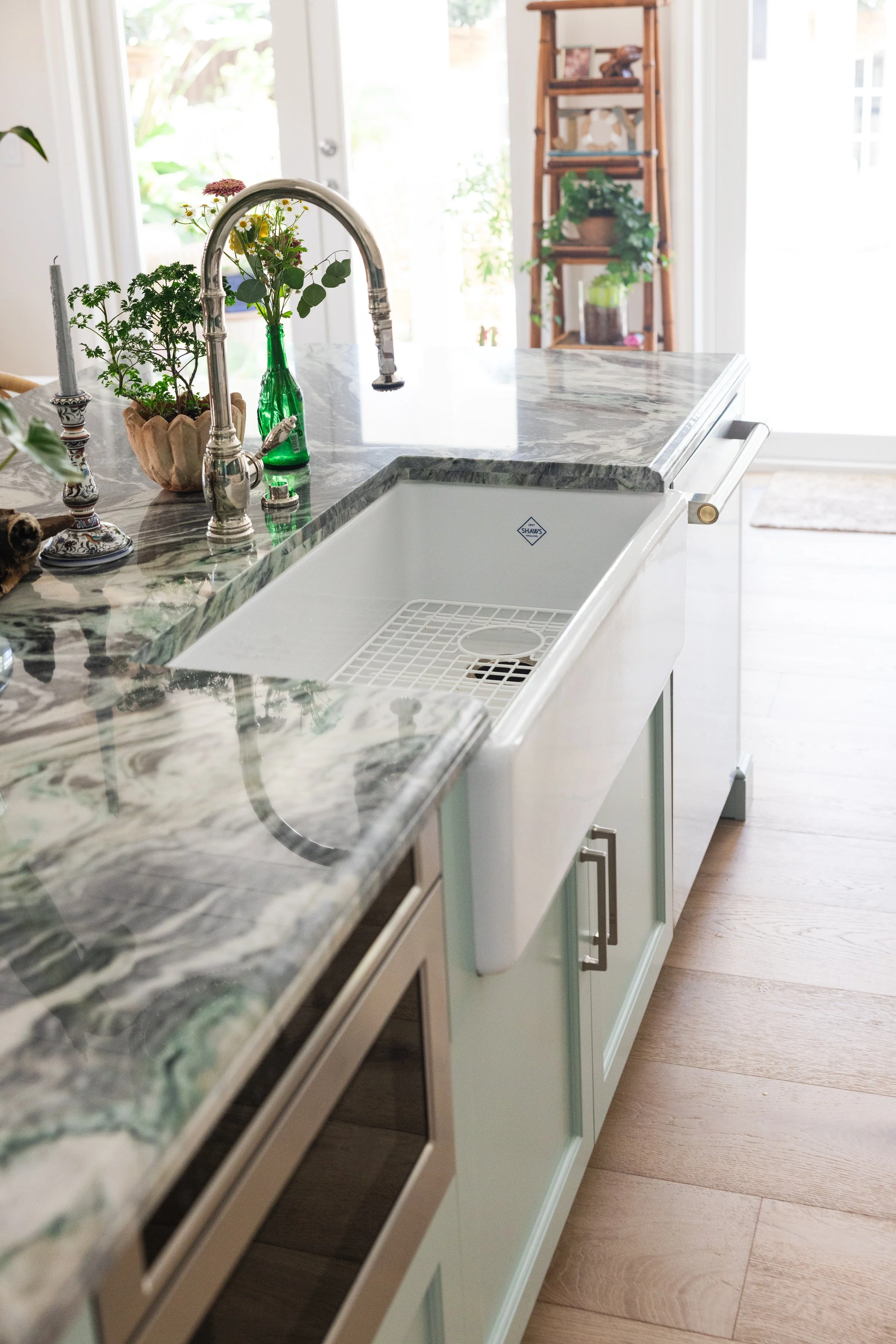 Ocean Breeze home view showing coastal property styling, updated surfaces, and bright residential design.