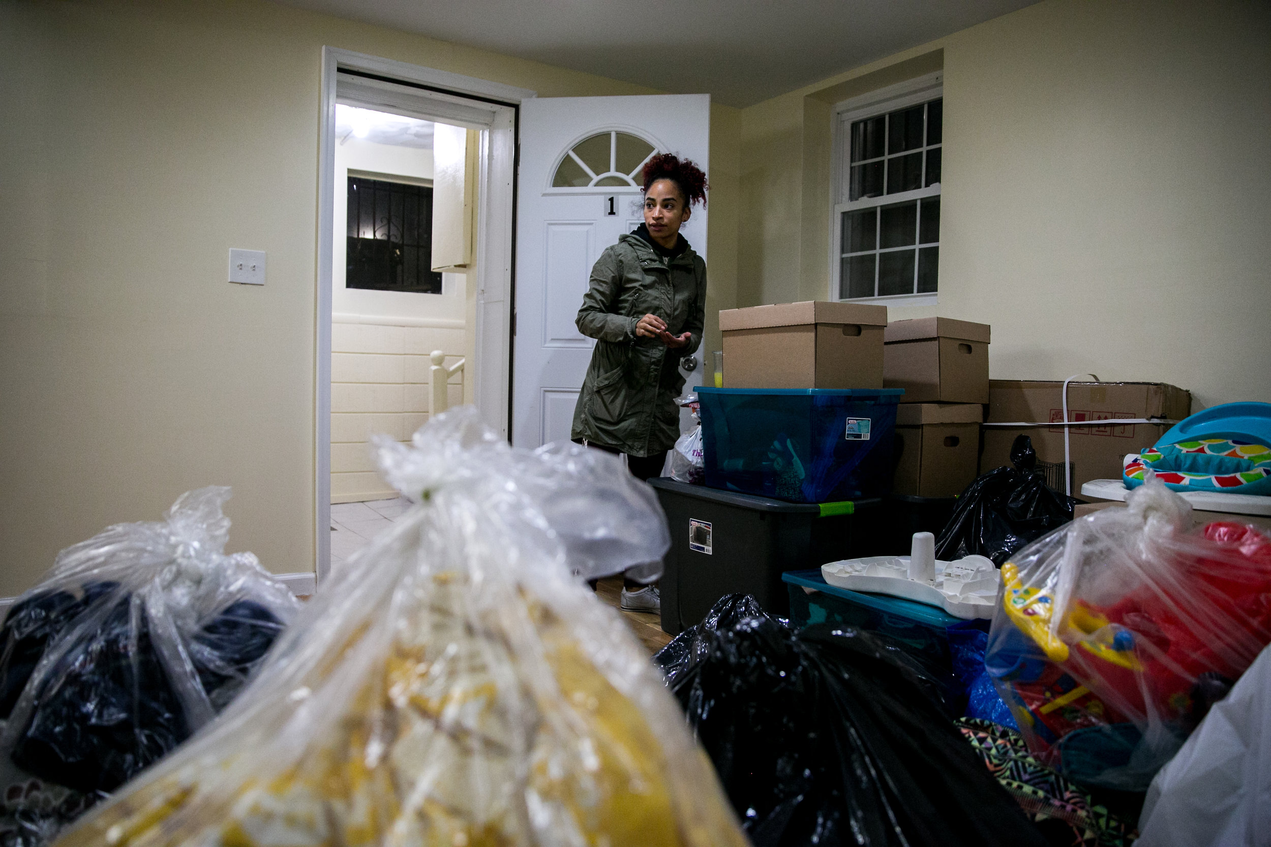  Madelyn Brito stands in her new apartment for the first time with all her belongings in East New York as she moves out of the Kingston Family Residence homeless shelter in Brooklyn, New York. 