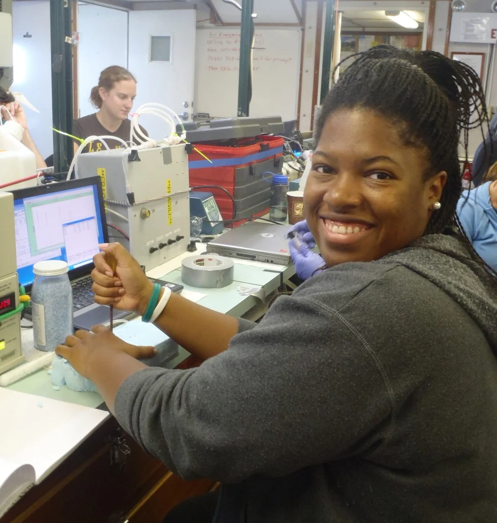 Chassidy running the gas chromatograph