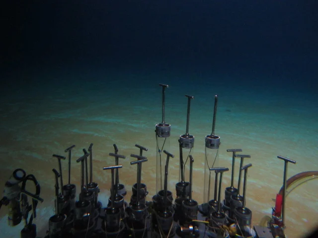 View of the "Red Crater" from the Pilot's window (the things sticking up in front are the tube cores we use to sample sediment
