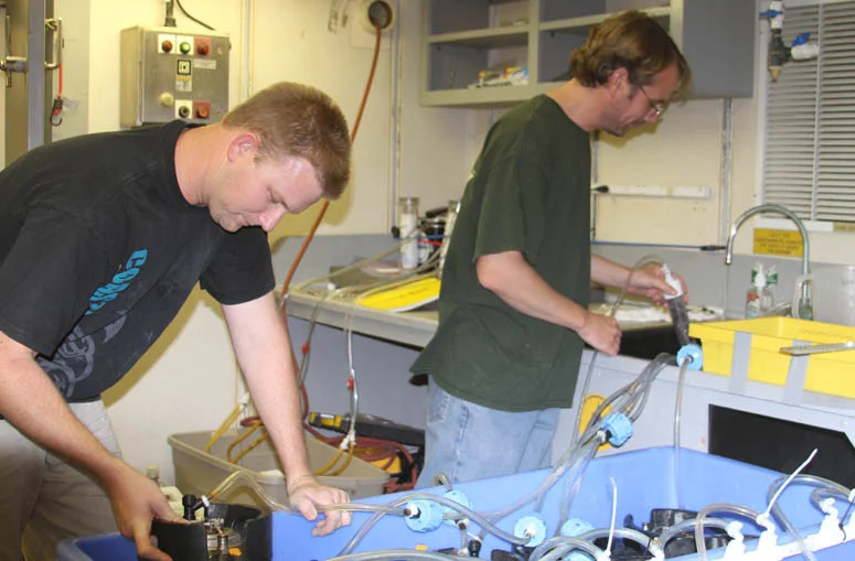 Rick Peterson and Rich Viso (CCU) preparing samples for radium analysis