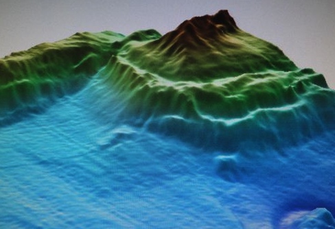 Multibeam seismic image of a mud volcano; the hotter colors are more shallow, showing how the mud volcano rises from the seafloor
