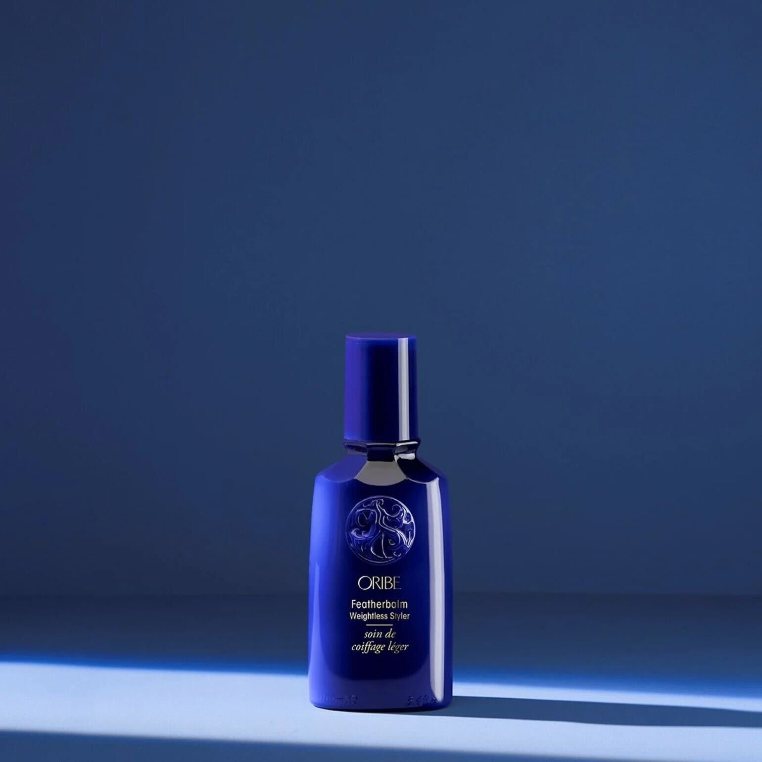 Oribe Feather Balm Weightless Styler.jpg