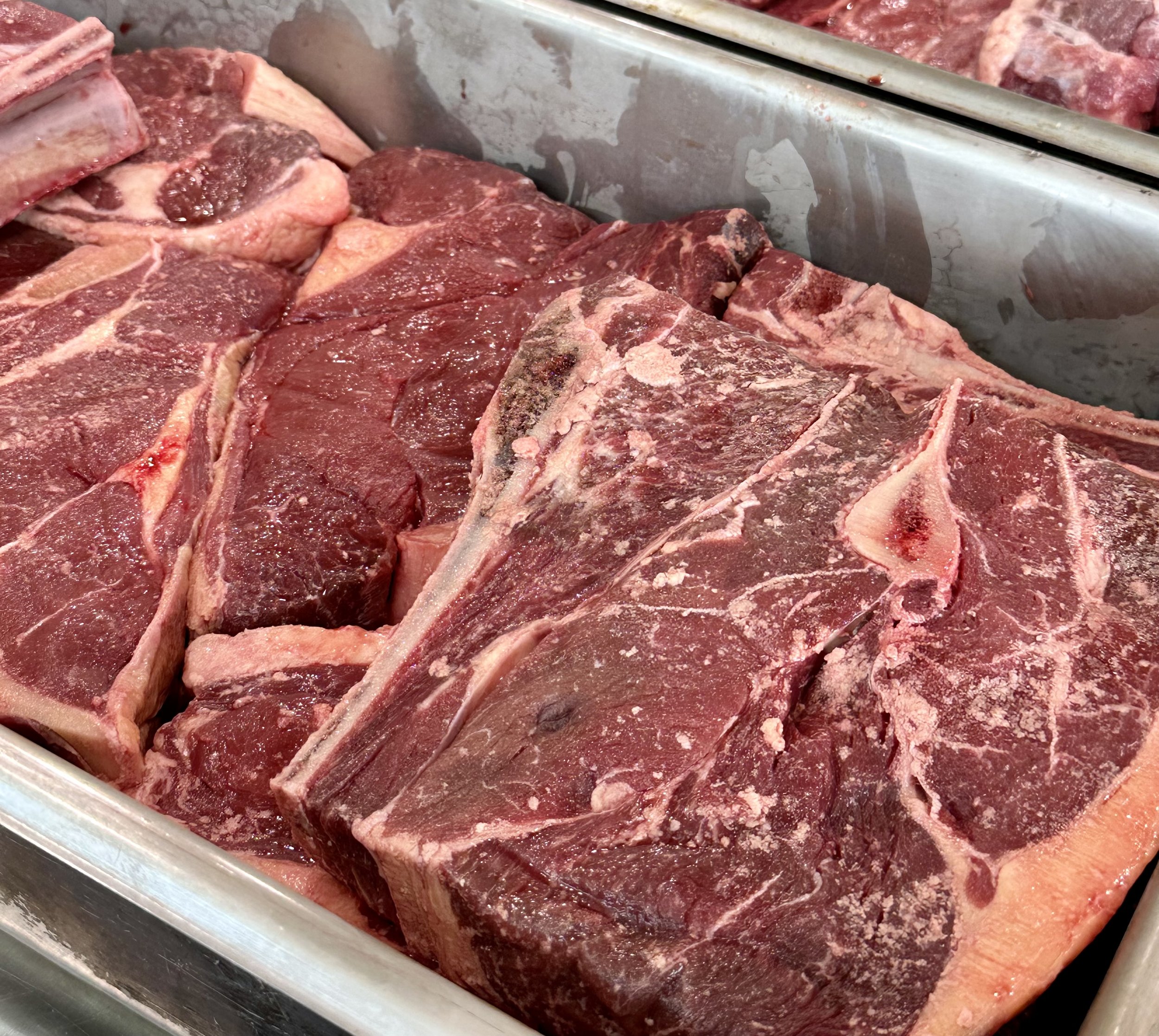 pan of Polyface grass-fed roasts