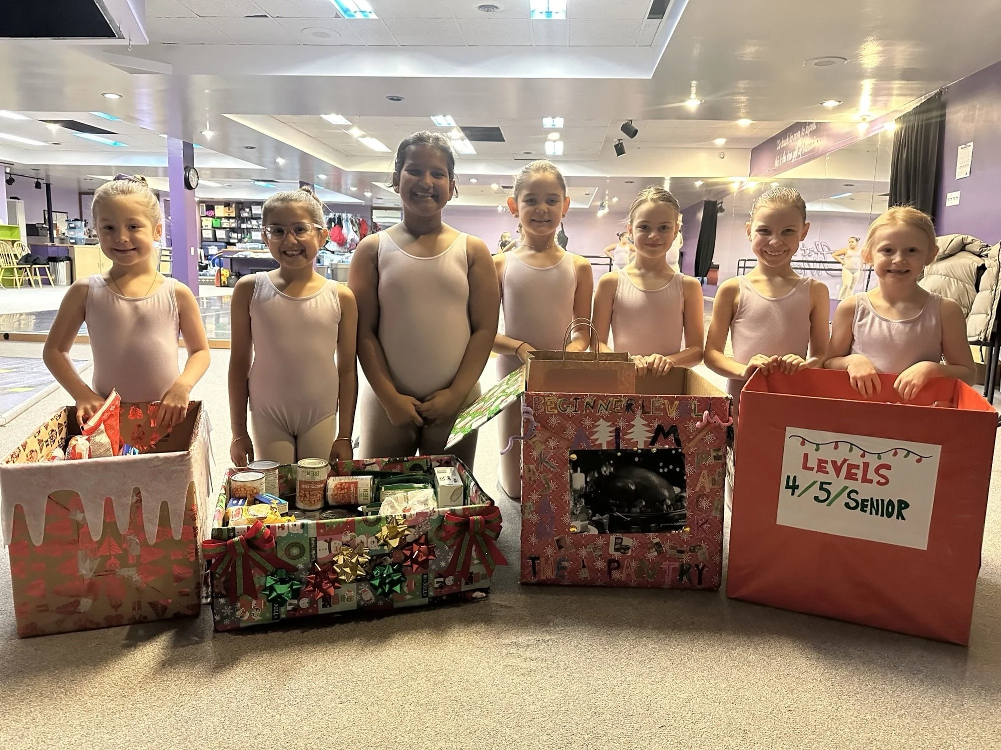 We would like to send a big thank you to @aimdancestudio  for collecting food items for 'Ksan Place's Pack the Pantry food drive. Judging by those smiles, I think we can confirm that giving can feel just as good as receiving! Thank you for supporting