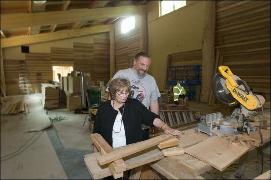 cecile and james in longhouse in progress from seattle pi.jpg