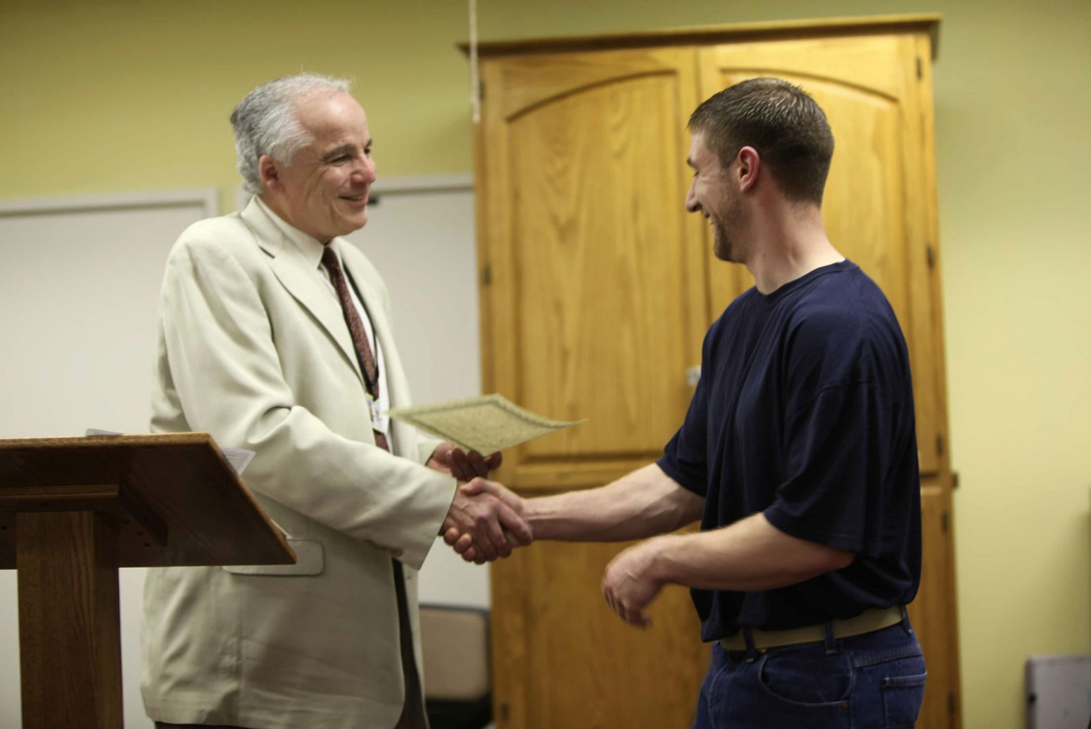 Professor Steven Shankman at a closing ceremony for an Inside-Out class