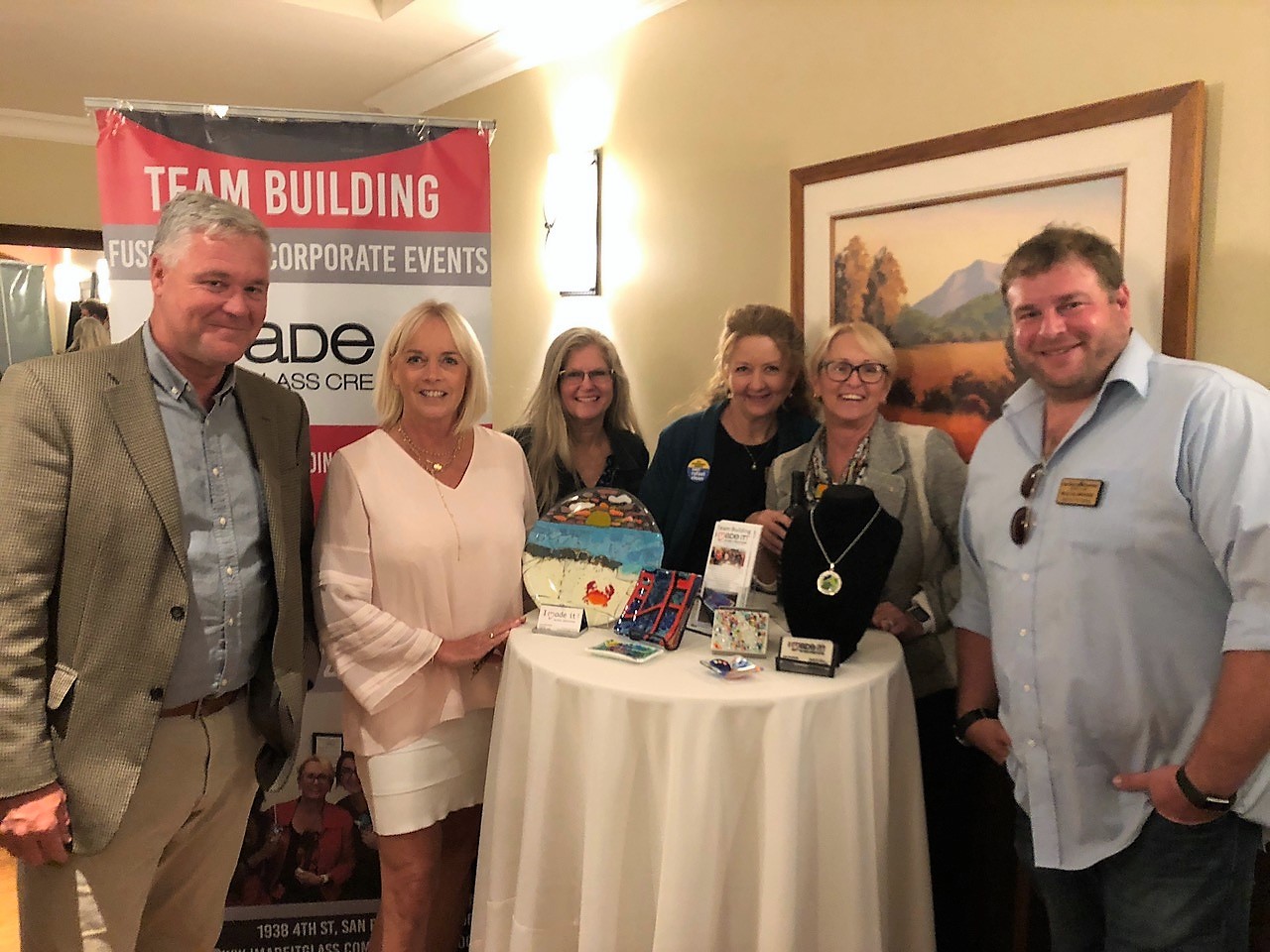 Leslie, Joanne, and Lynn with the Showcase judges to accept the “Most Fun Booth” award!
