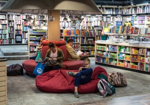 people-sitting-on-sofas-and-reading-books-in-bookstore.jpg