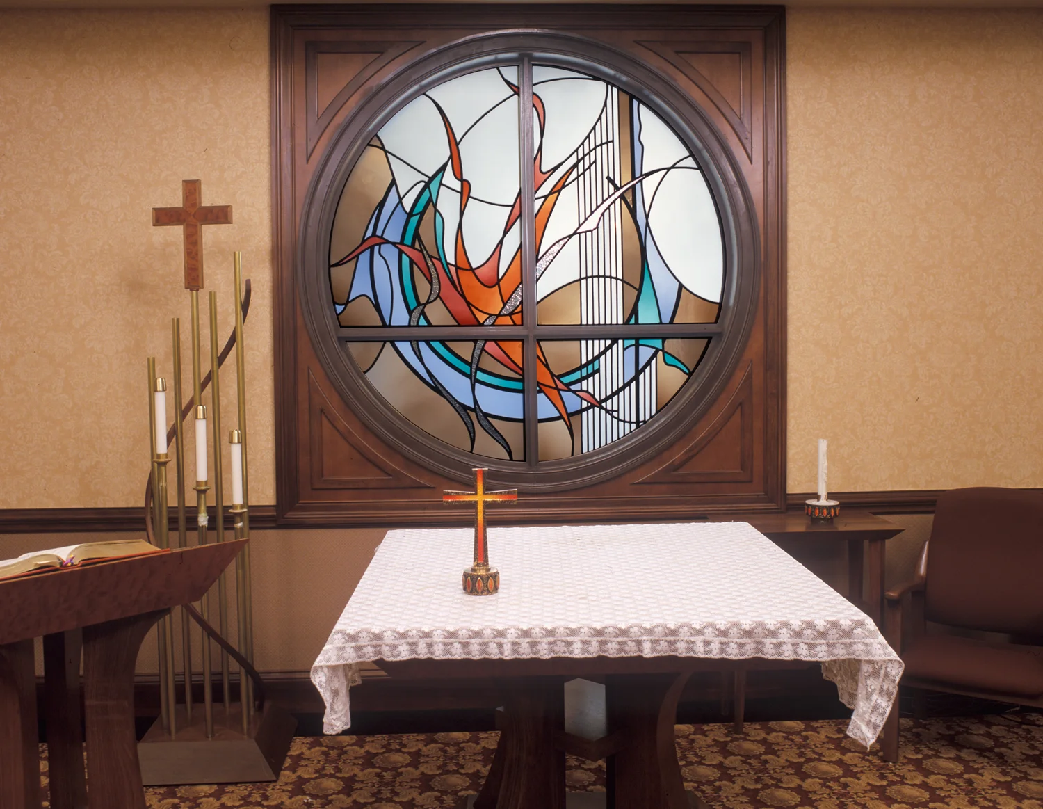 The room also services as a Chapel, so this window, with a more spiritual theme, serves as a backdrop to the Altar.