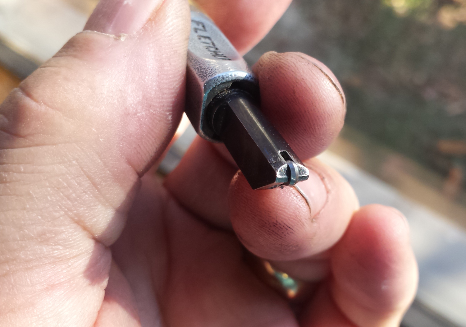 A typical commercial glass cutter.