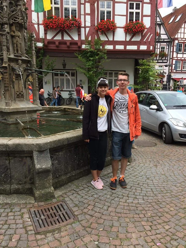 Young Professional member Abby Naumann with Tobi Mielich, a former German exchange student and scholarship recipient in Bad Urach at the annual Schäferlau.
