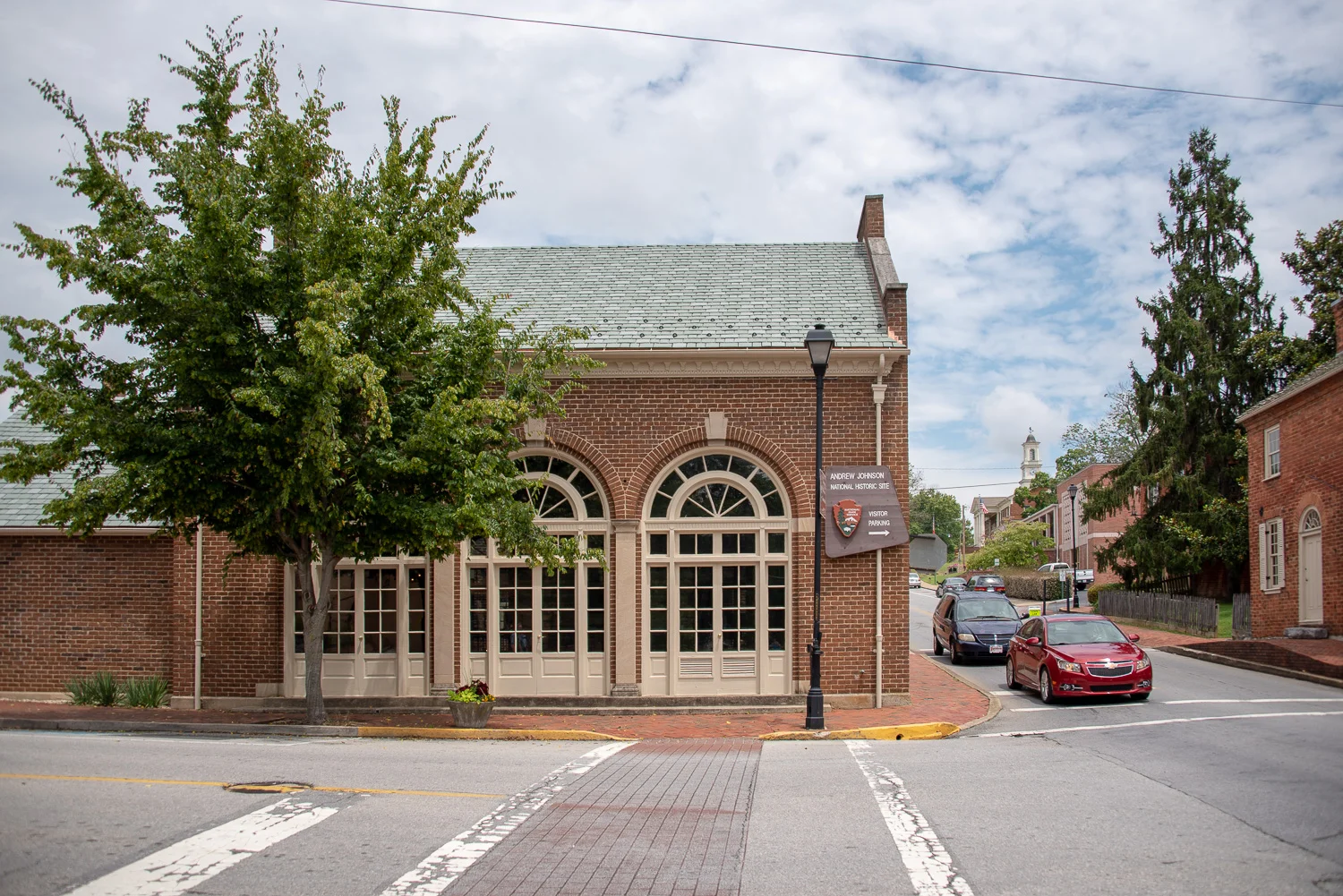 The Andrew Johnson NPS Visitor Center. Johnson's tailor shop is located just behind the large arched windows.