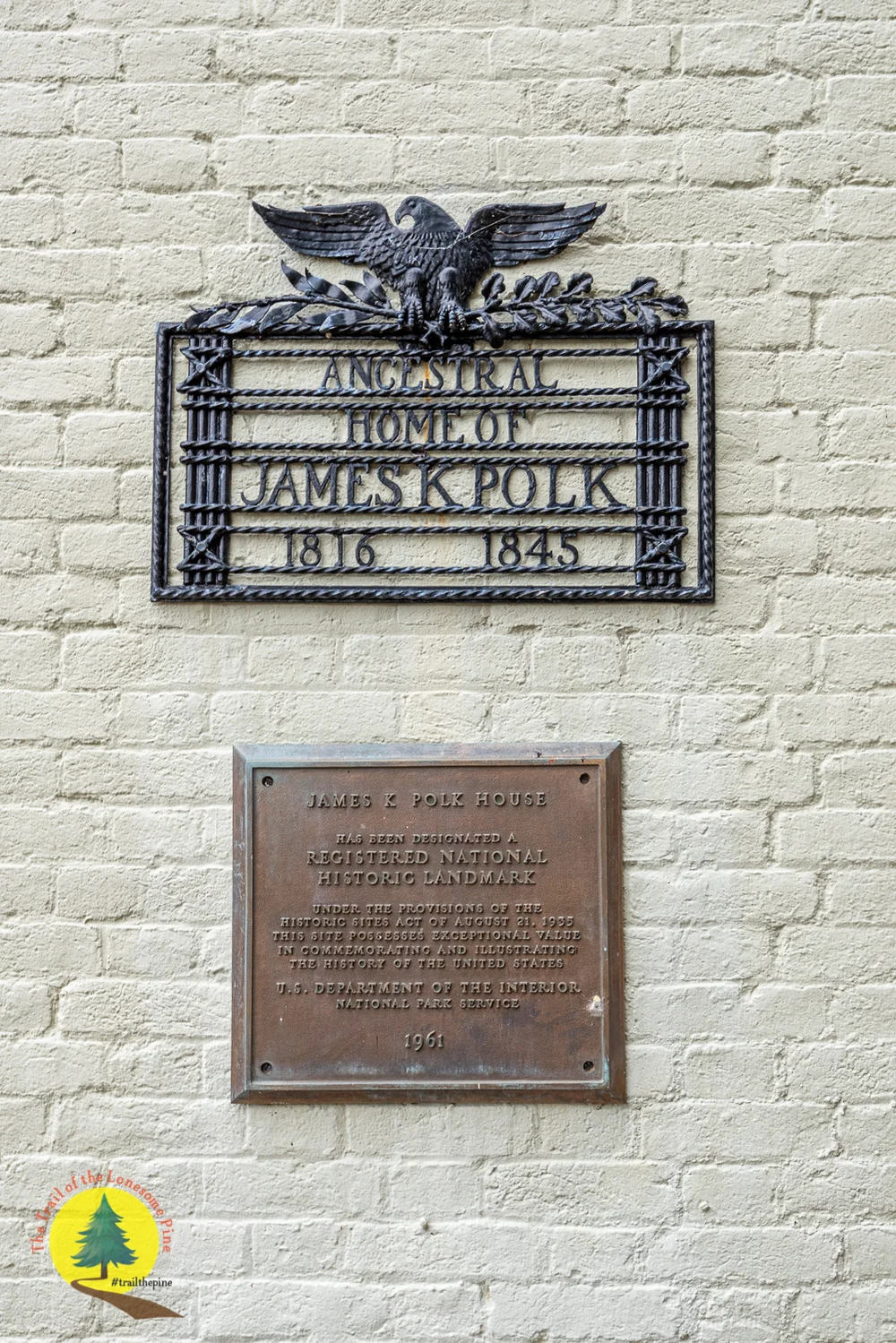 Plaques located next to the front entrance