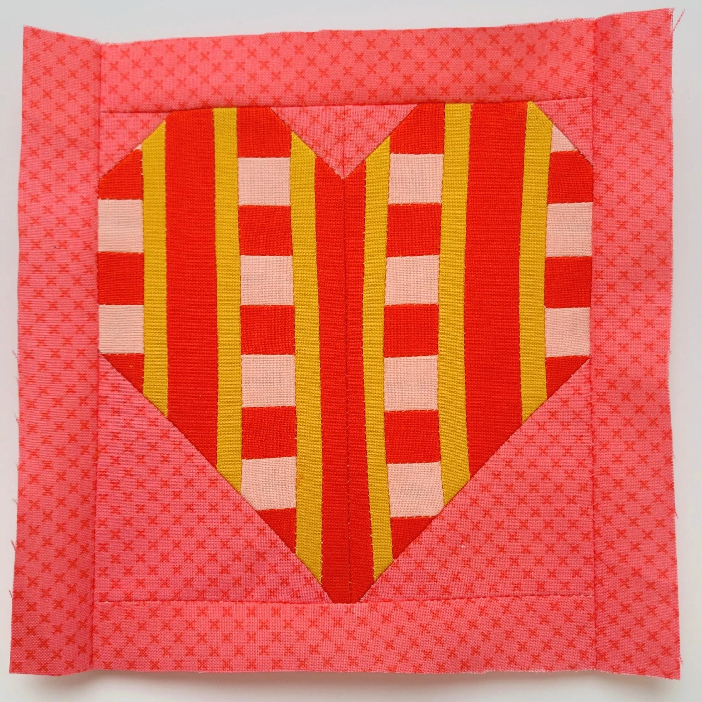 StripedandCheckedPatchworkHeartQuiltBlock-Lauras-Studio.jpg