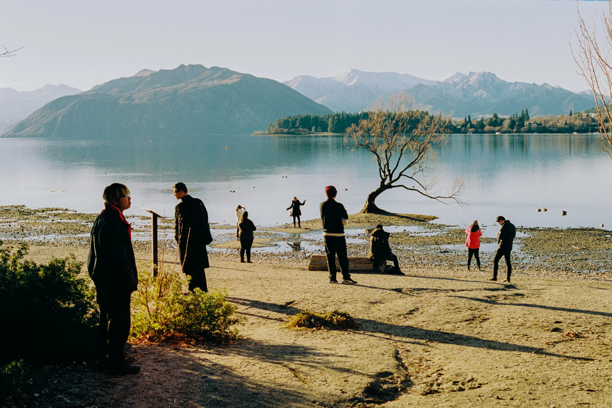  Lake Wanaka, Otago. I rode around the lake on a lonesome afternoon, admiring tourists interacting with their surroundings. I stopped and watched the individuals, dancing with the landscape and each other. 