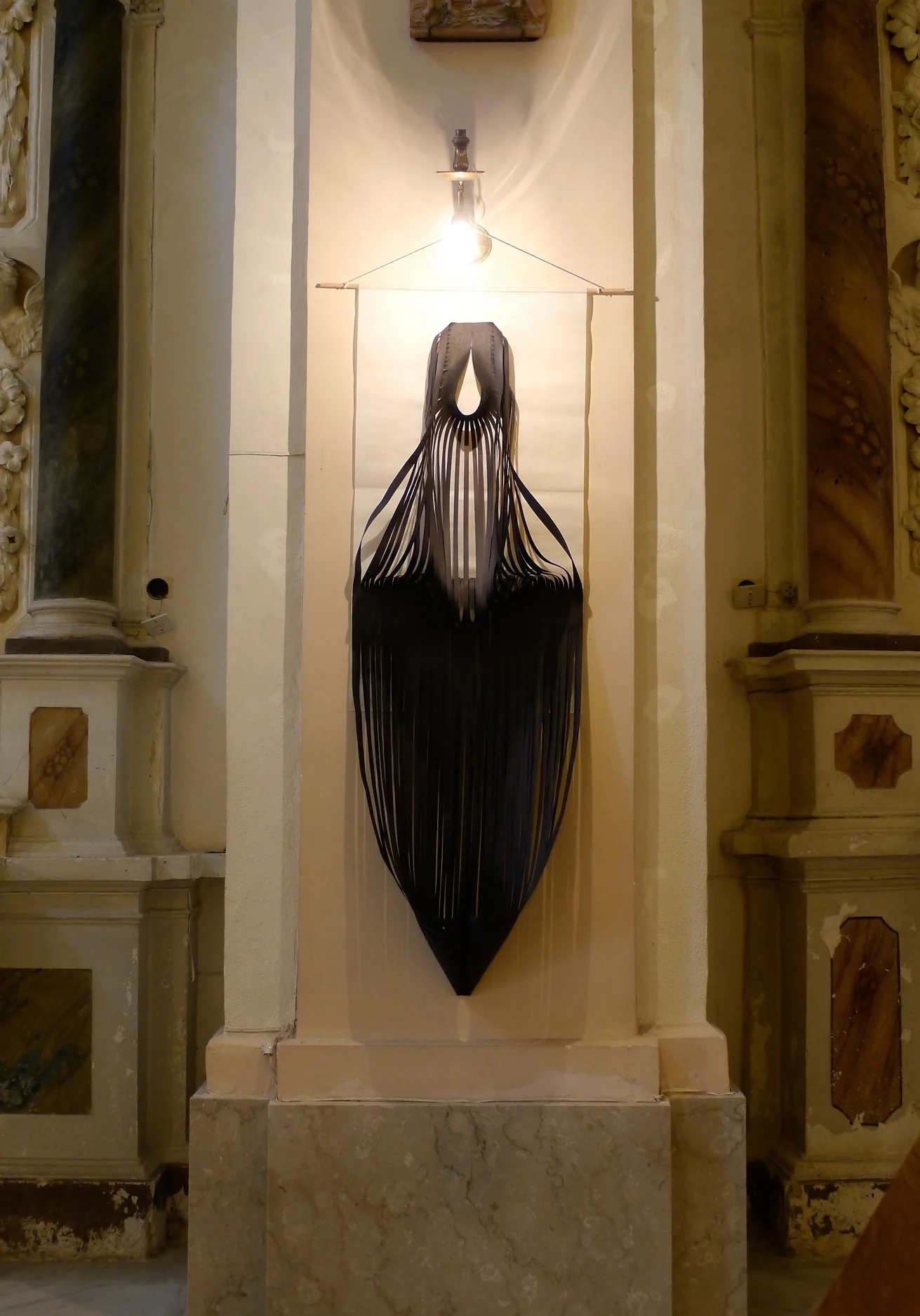 Dark Flow 1, black paper sculpture approximately 1.5 metres tall.