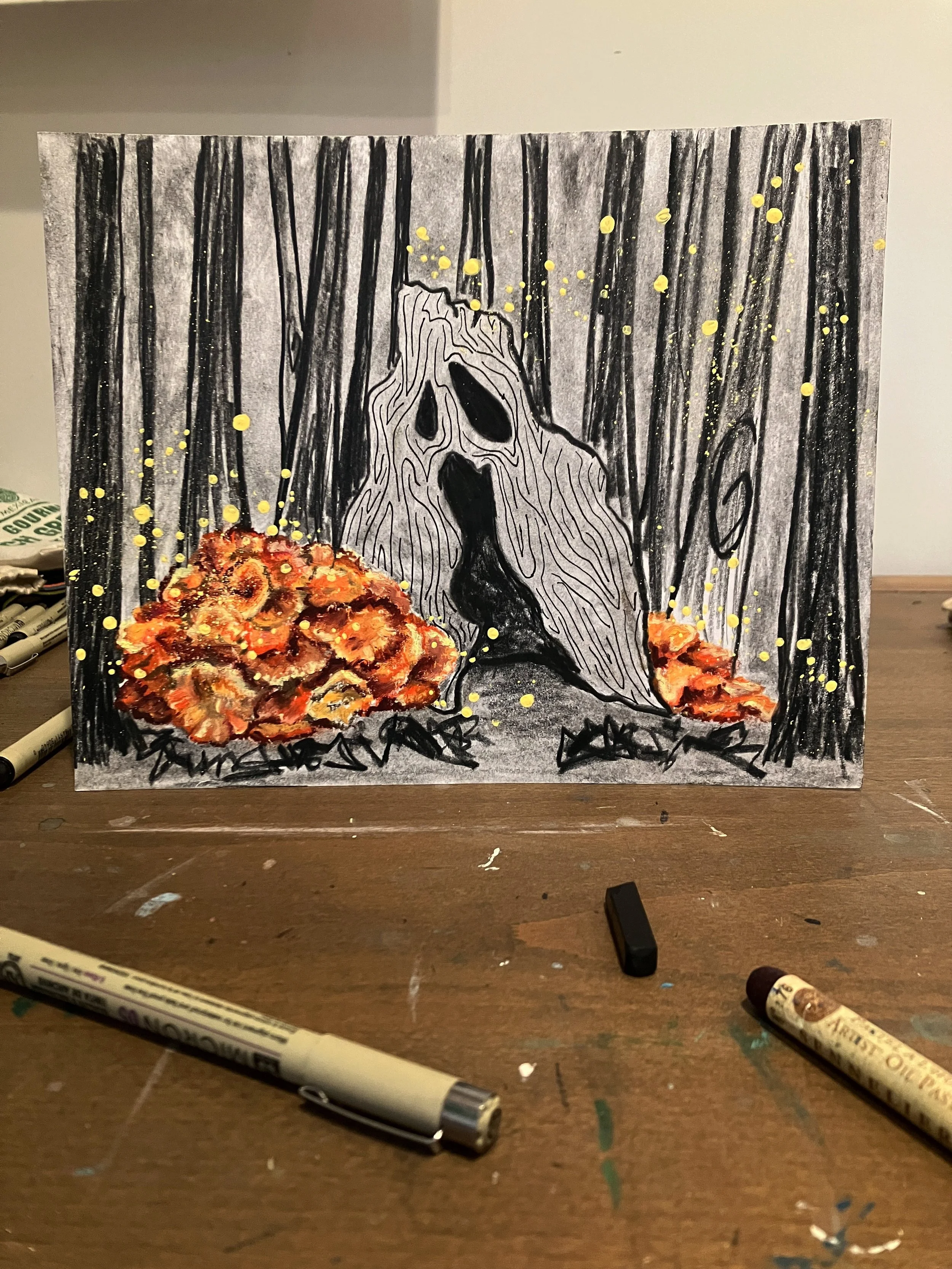 The soft rotting flesh consumes the wood  H O L L O W E D beware that you, yourself, aren&rsquo;t followed by the orange fungus piled high amidst the copse. The shadows, they grow long between the
T R E E S
have you ever seen a wood as inky black as 