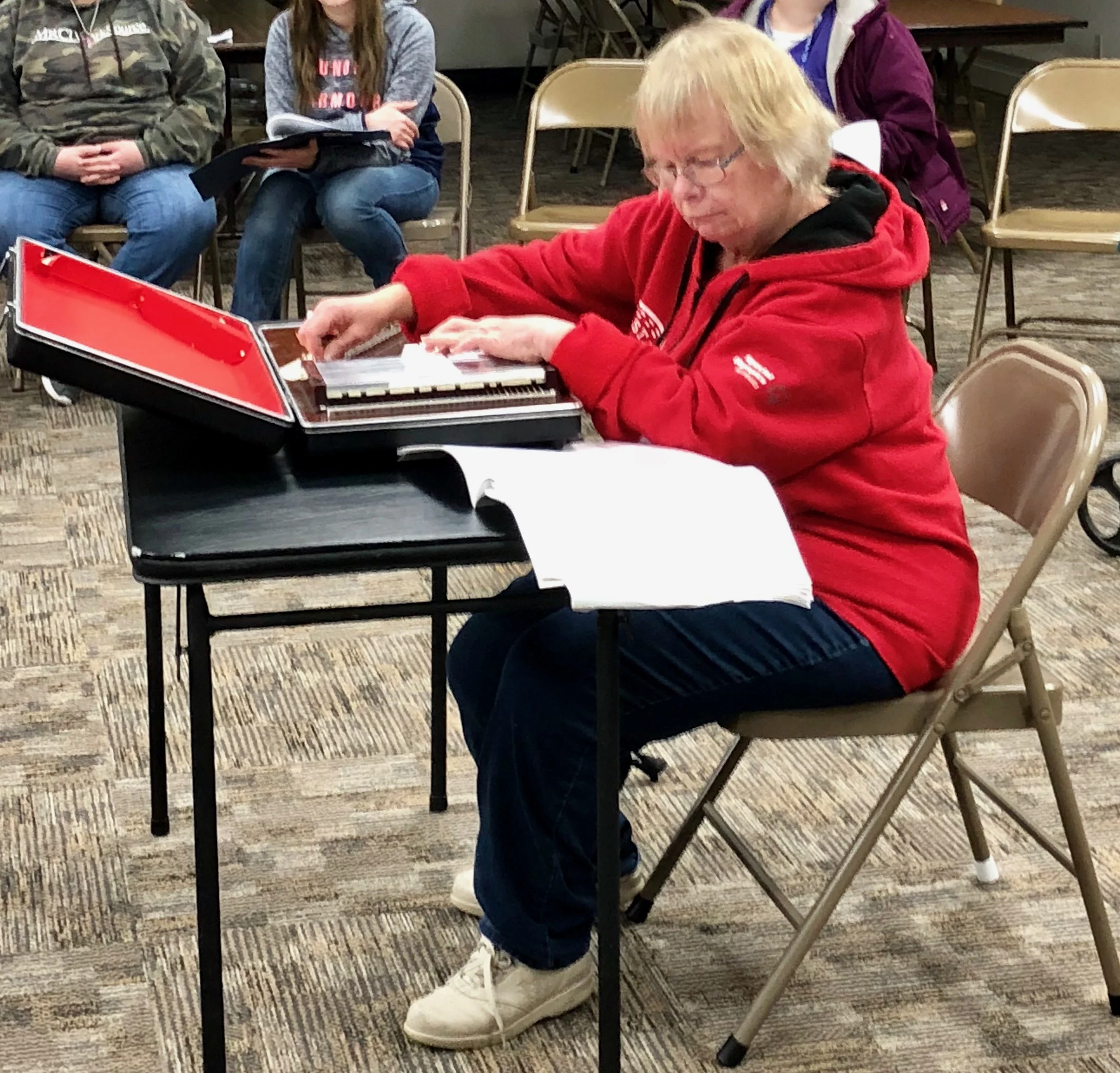 Julie practicing her autoharp for “Kat’s Kabaret” 2018