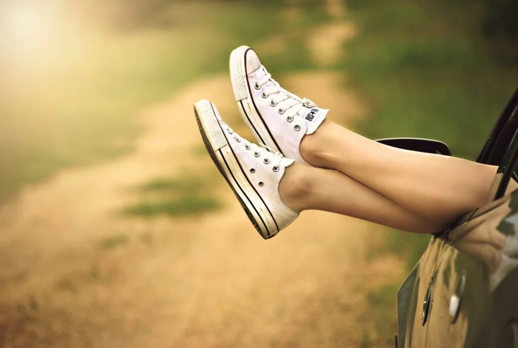 legs-window-car-dirt-road-51397-1024x687.jpeg