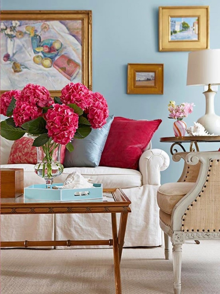 Blue-Wall-Color-with-Beautiful-Flowers-for-Latest-Colour-Combination-for-Summer-Living-Room-with-Gold-Framed-Wall-Art.jpg