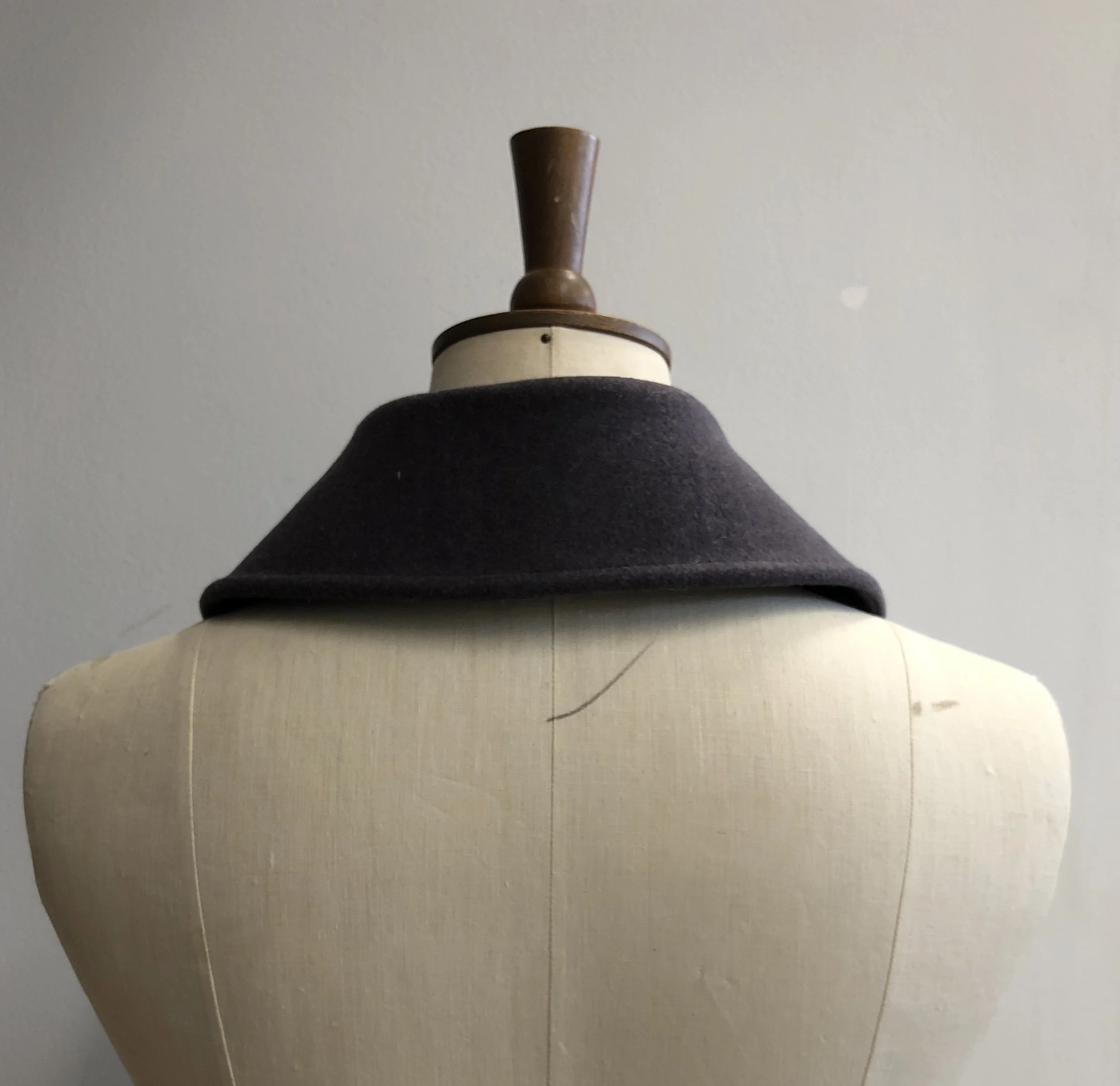  Notice how high the collar ride up the neck 