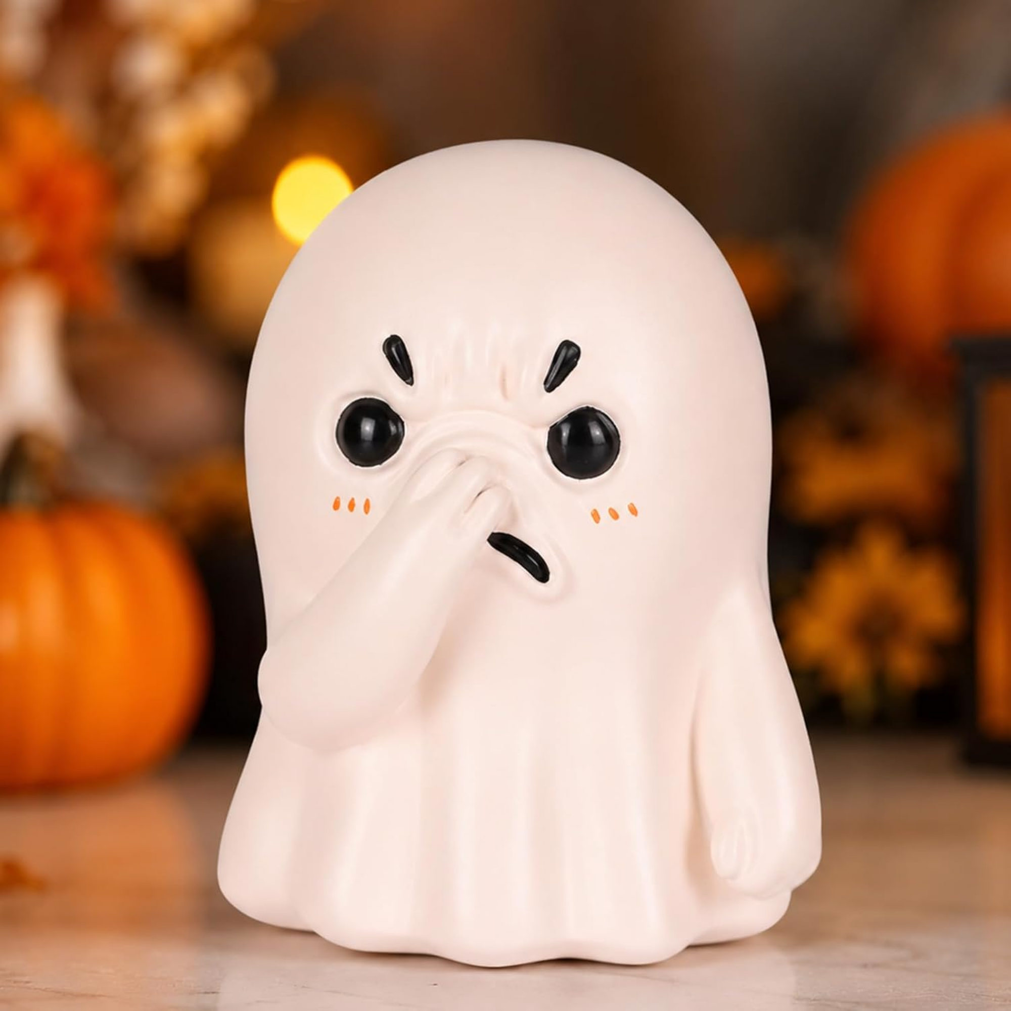 Holding Nose Ghost Figurines