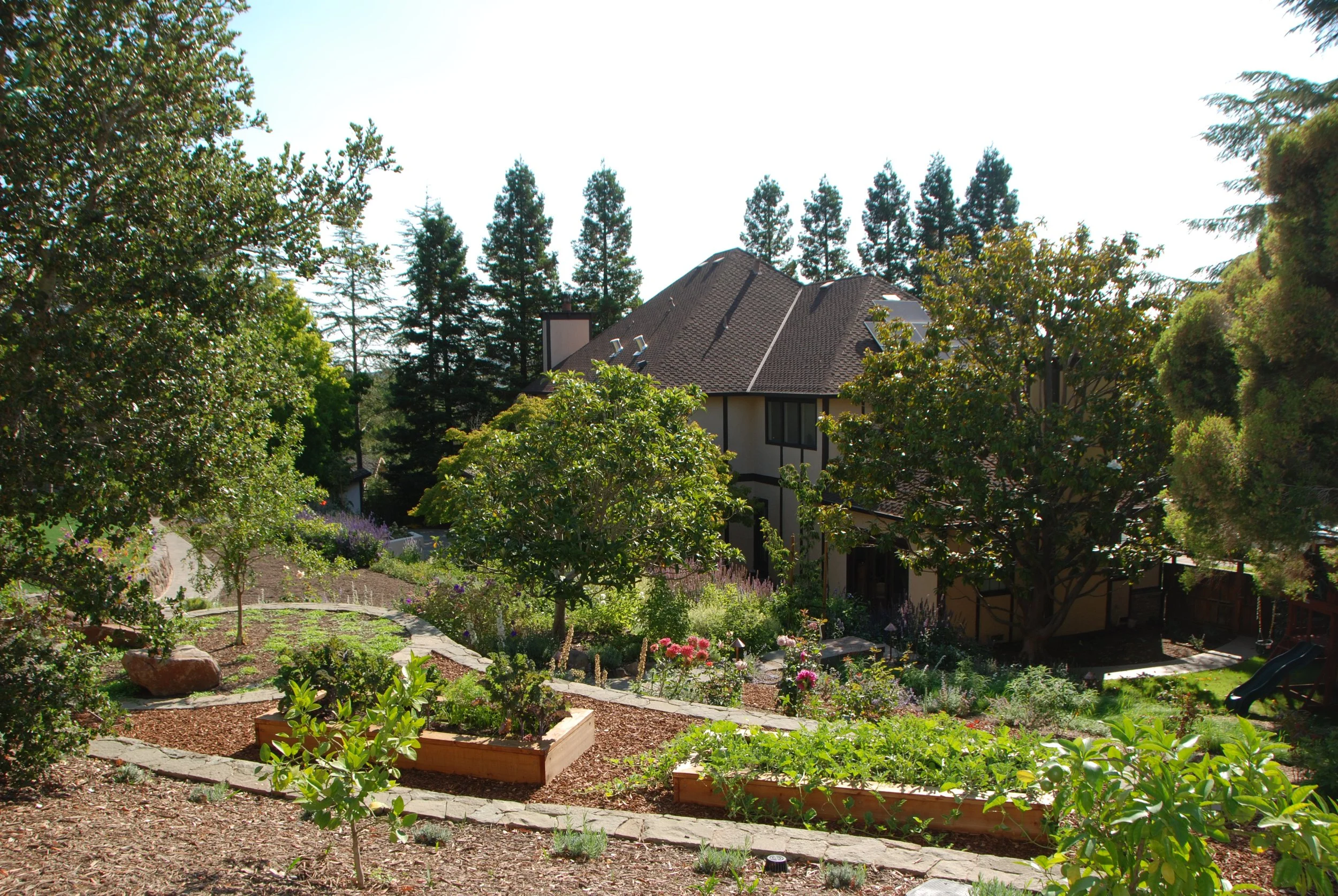 Planted beds are on a terraced garden.