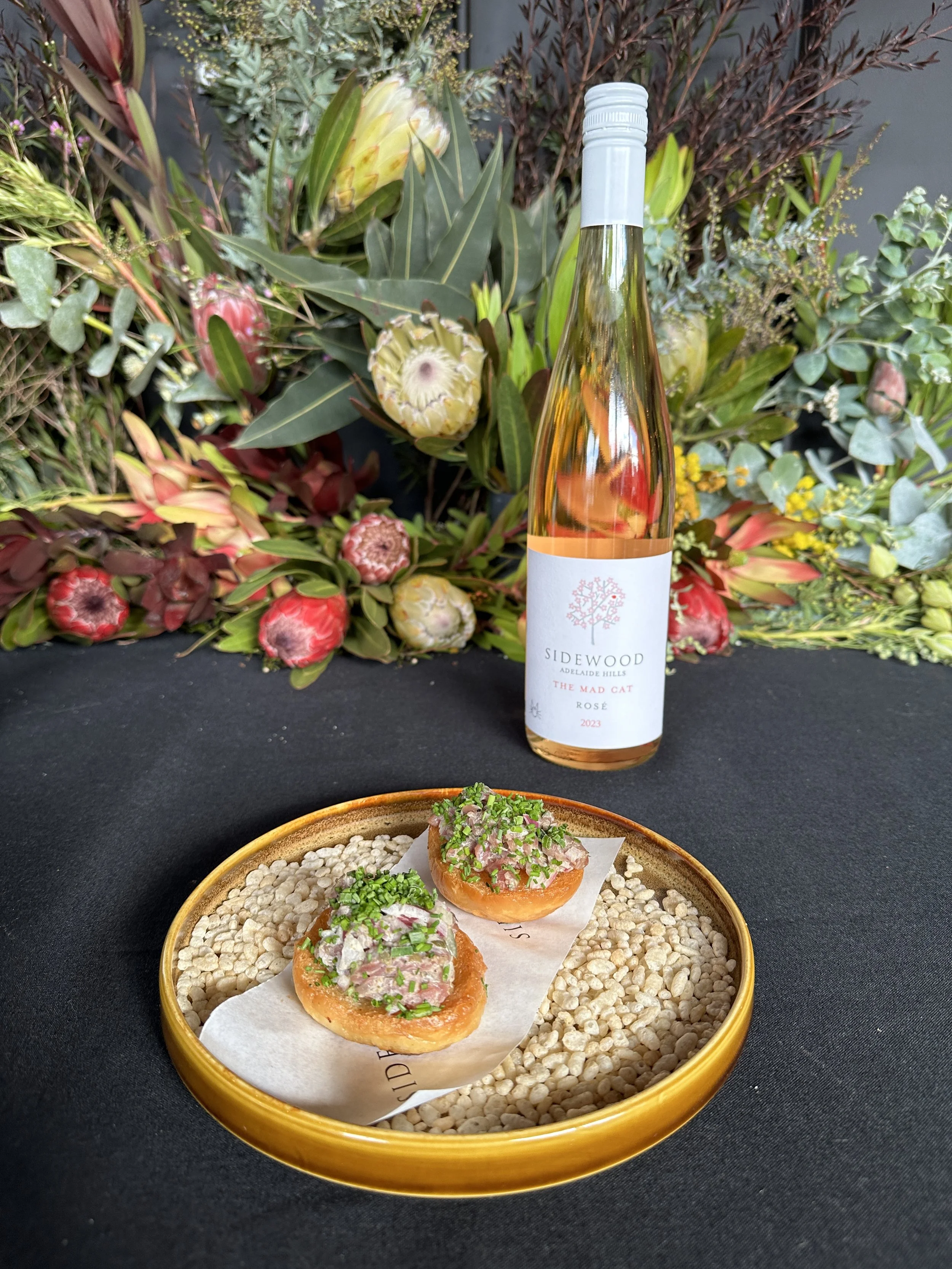 Entree - Wagyu crostini, house pickles, chilli and caper tapenade 